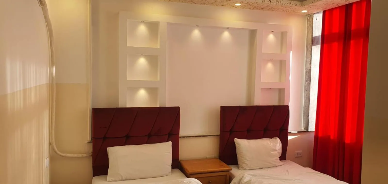 Bed in Aljazeera Hotel Apartments