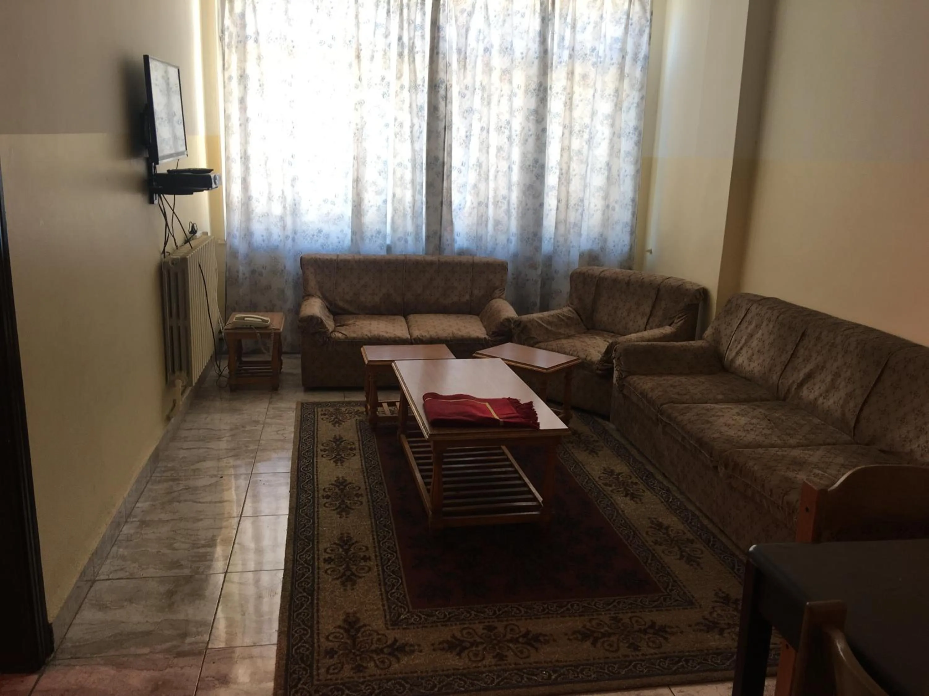 Living room in Aljazeera Hotel Apartments