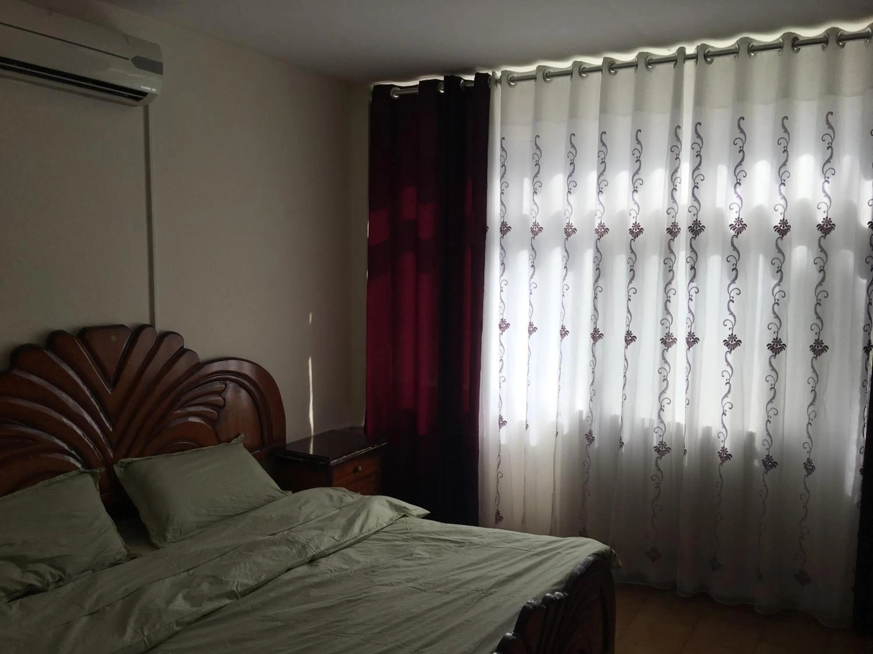 Bedroom in Aljazeera Hotel Apartments