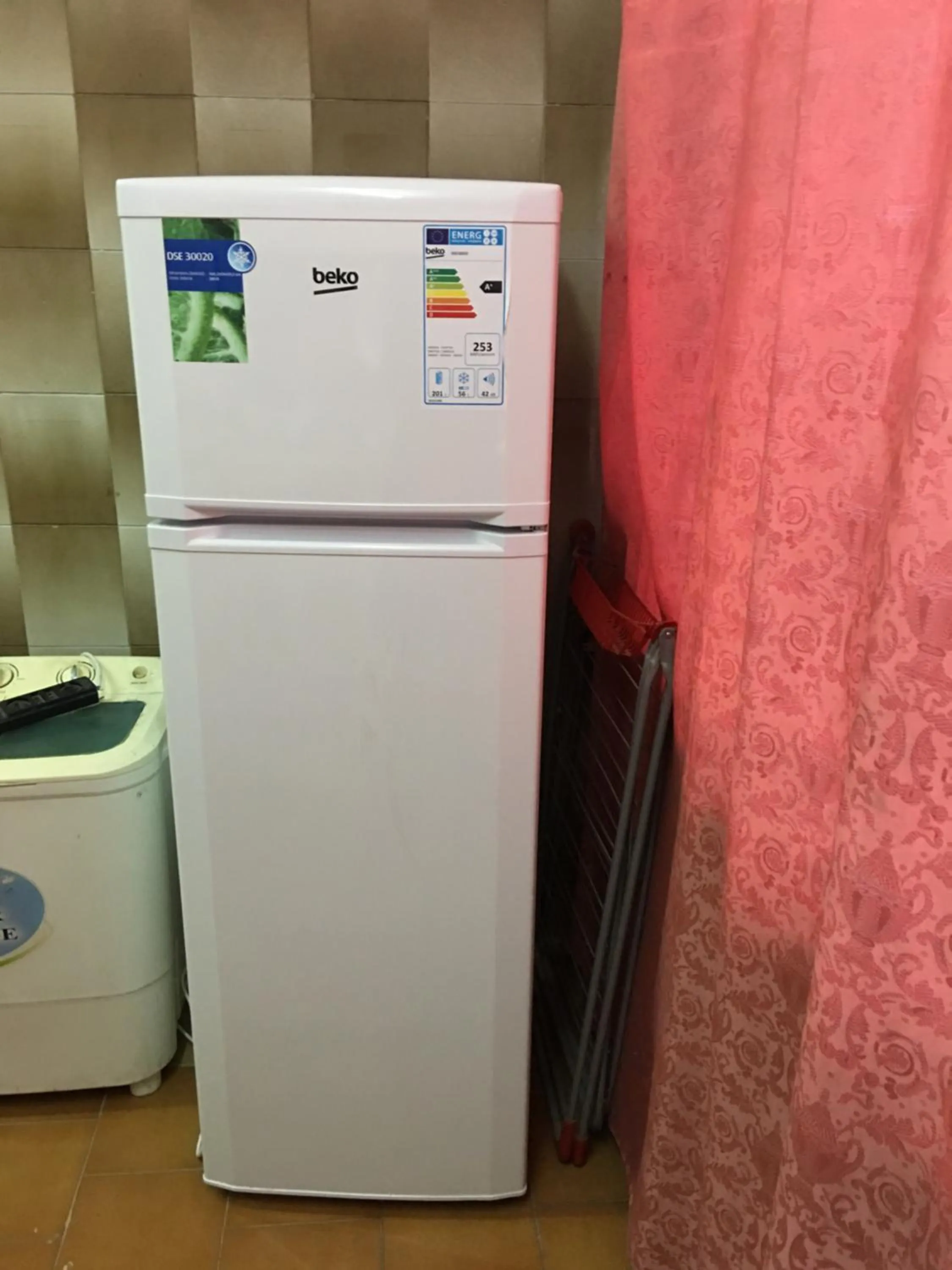 Kitchen or kitchenette in Aljazeera Hotel Apartments