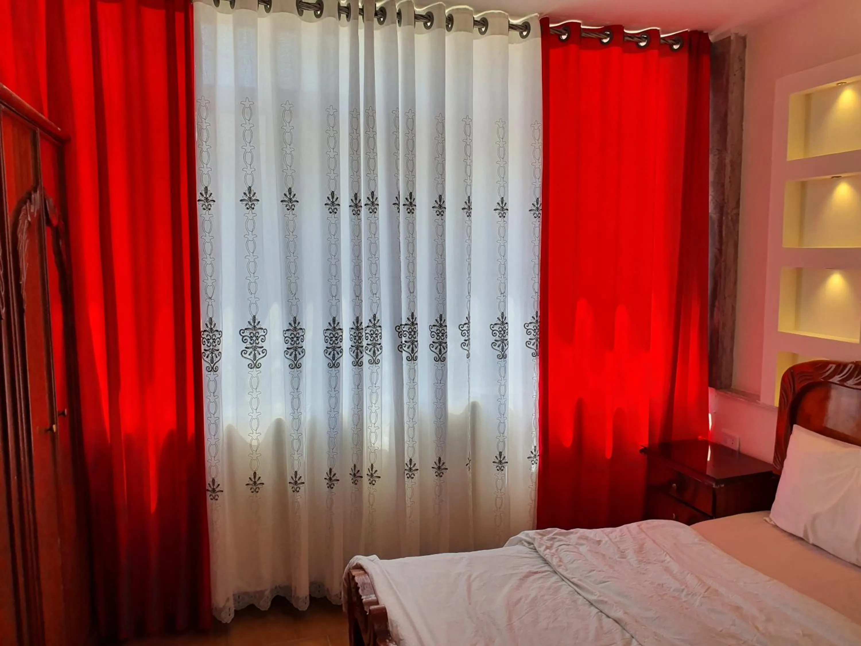 Bedroom in Aljazeera Hotel Apartments