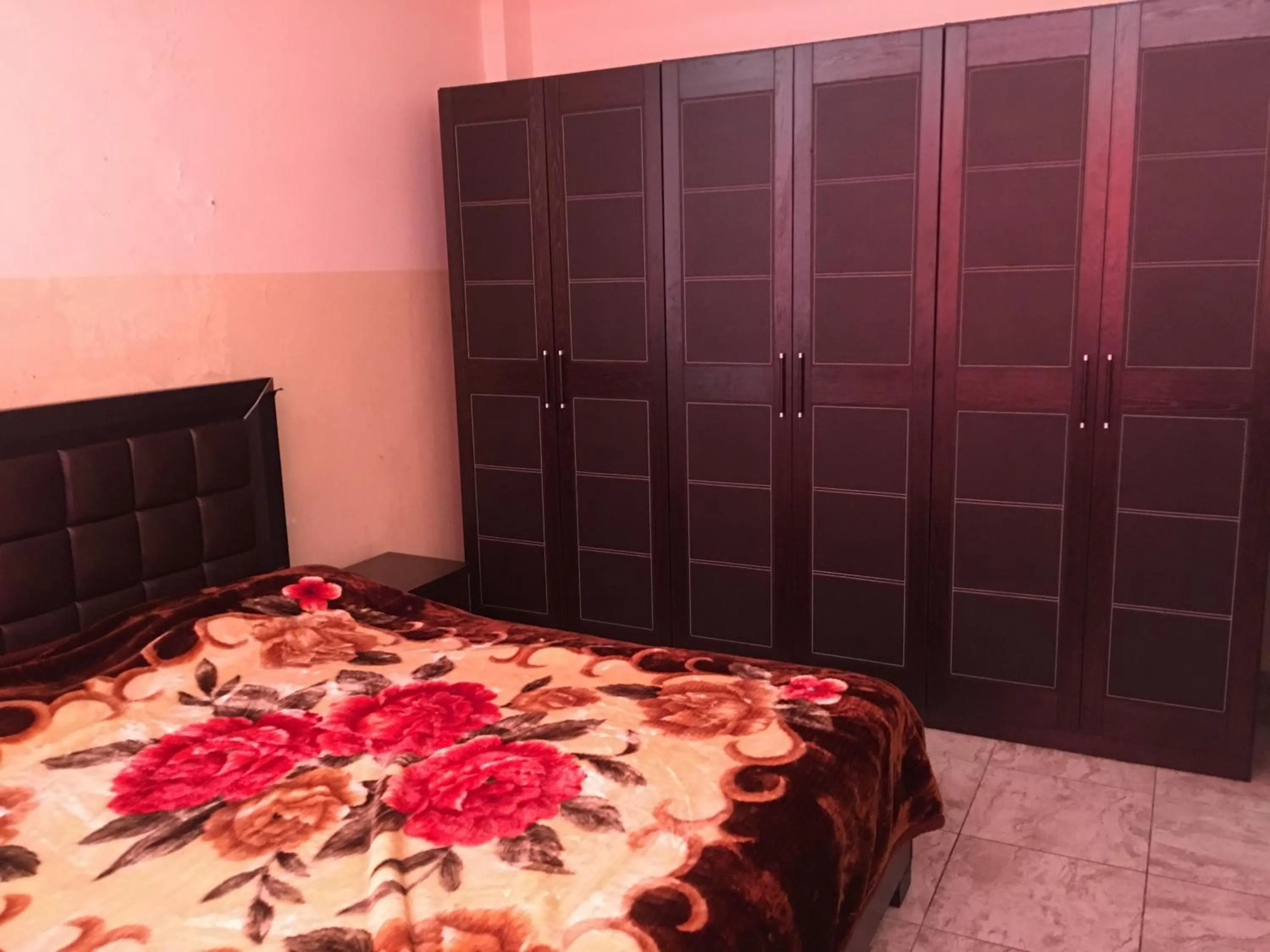 Bedroom in Aljazeera Hotel Apartments