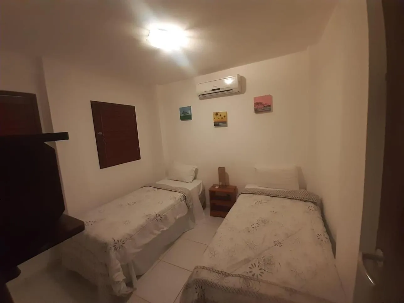 Bed in Recanto da Praia Pousada