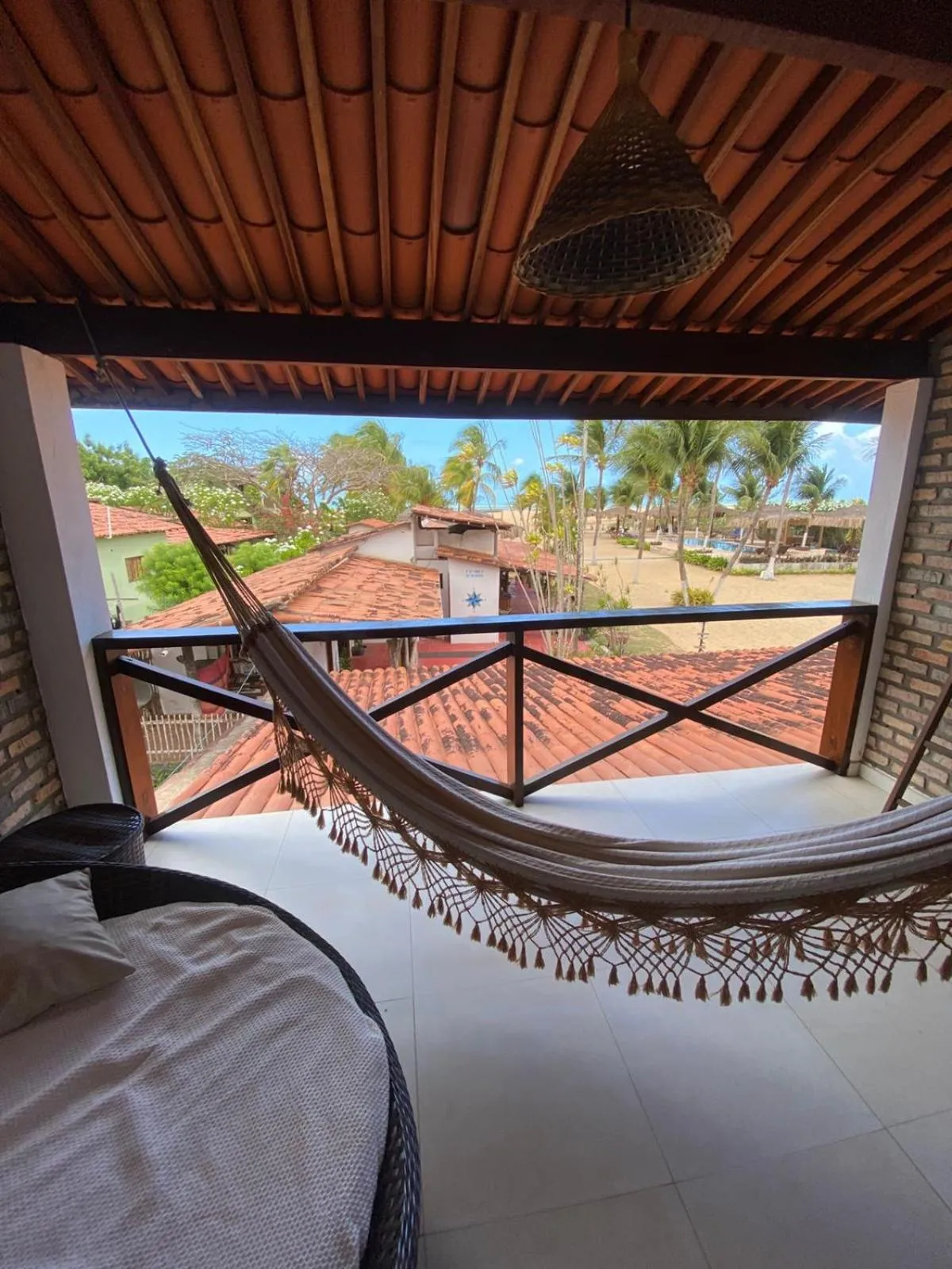 Bed in Recanto da Praia Pousada