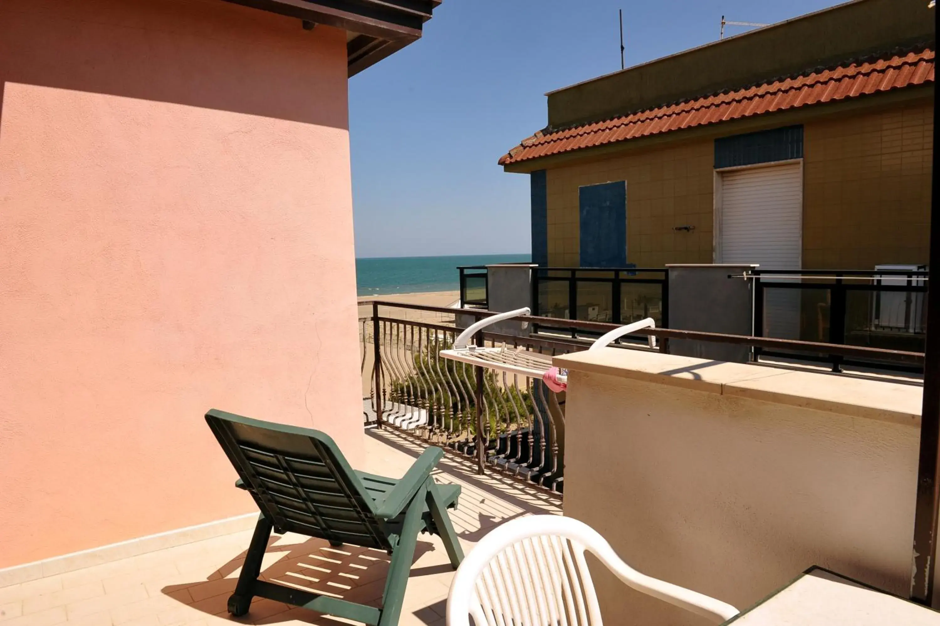 Quadruple Room with Sea View in La Perla delle Saline Quadruple Room with Sea View in La Perla delle Saline