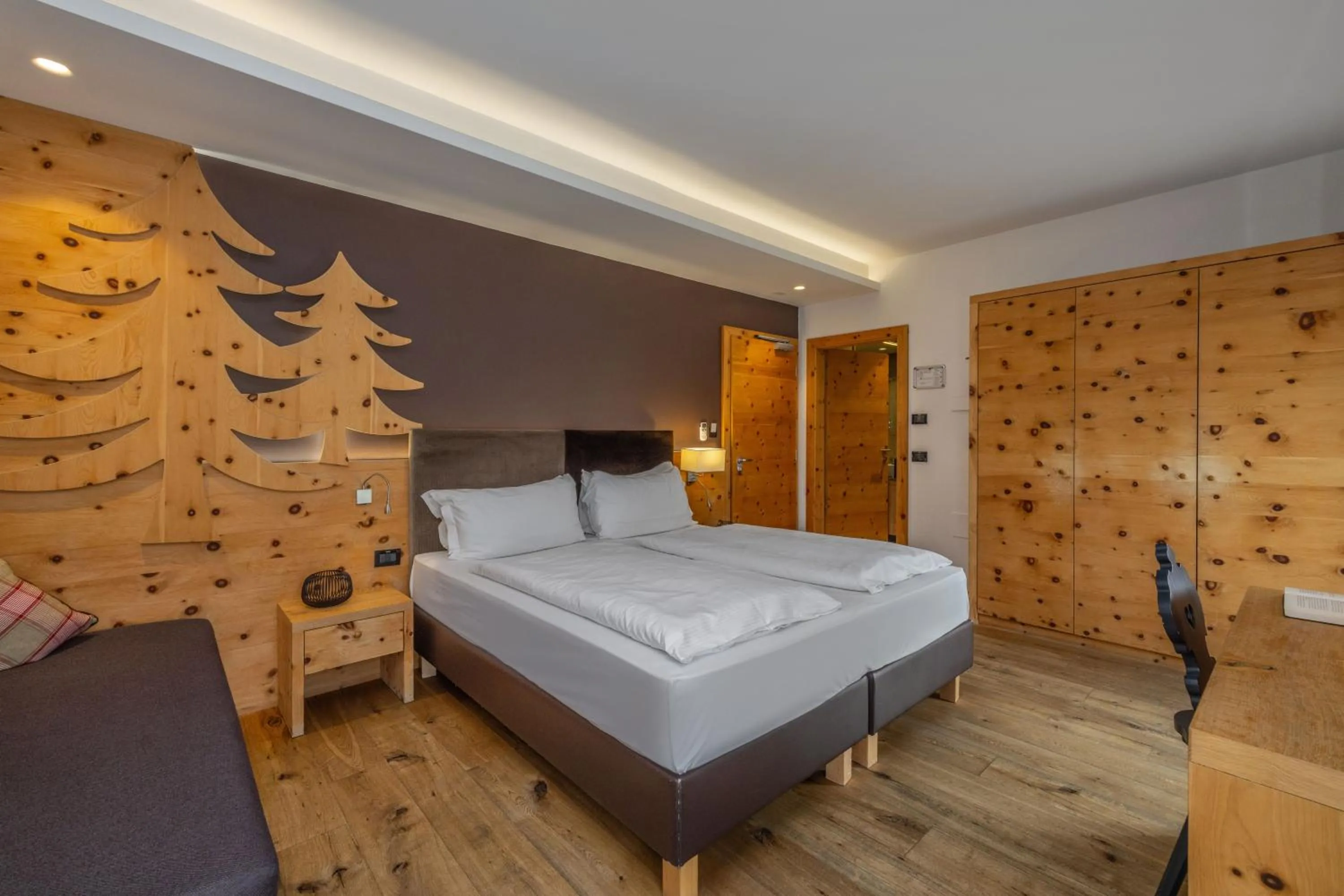 Bed in Hotel Ravelli Luxury Spa