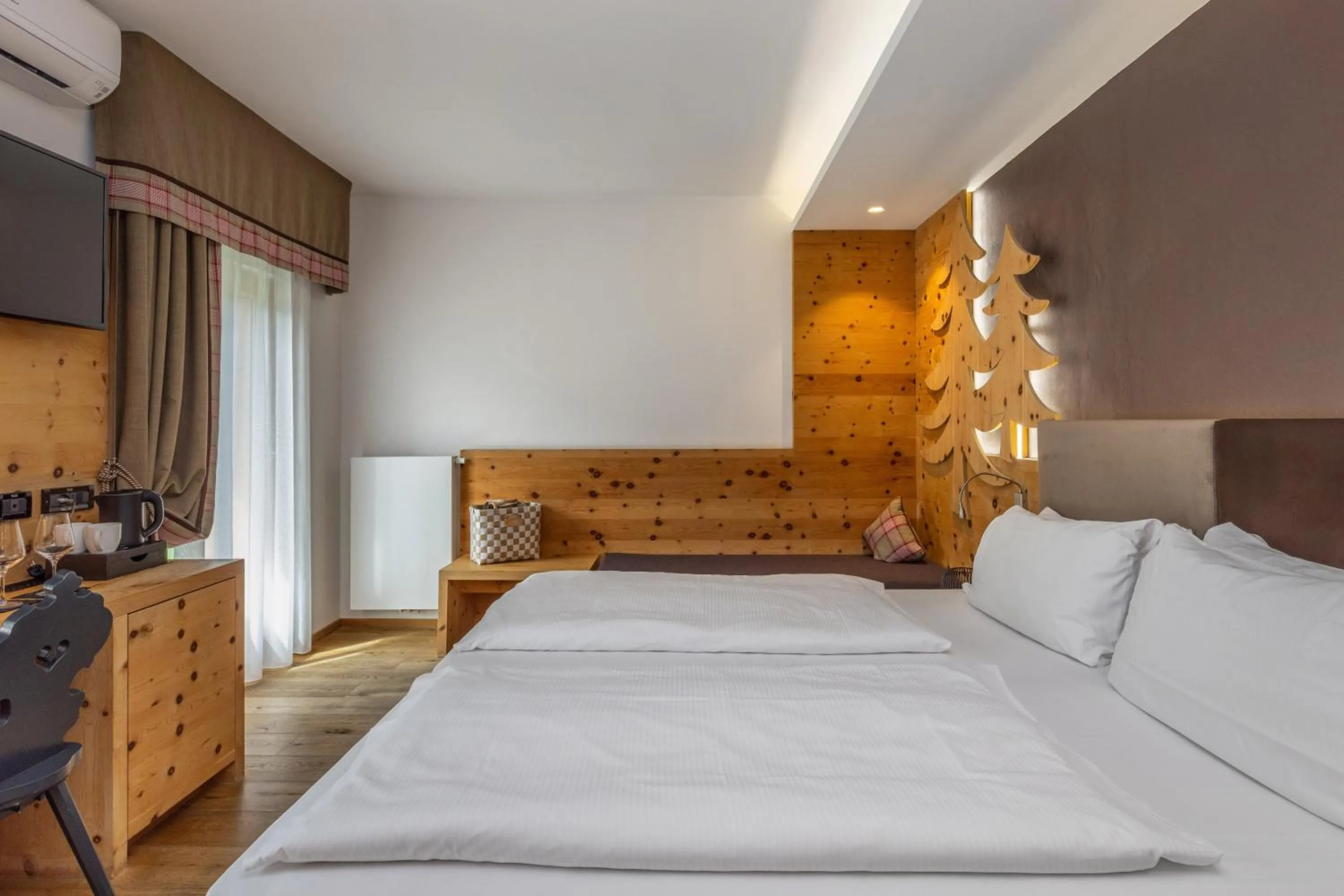 Bed in Hotel Ravelli Luxury Spa