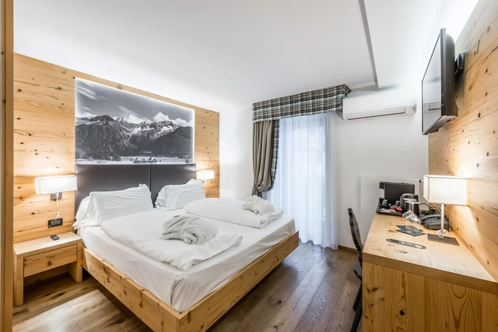 Bed in Hotel Ravelli Luxury Spa