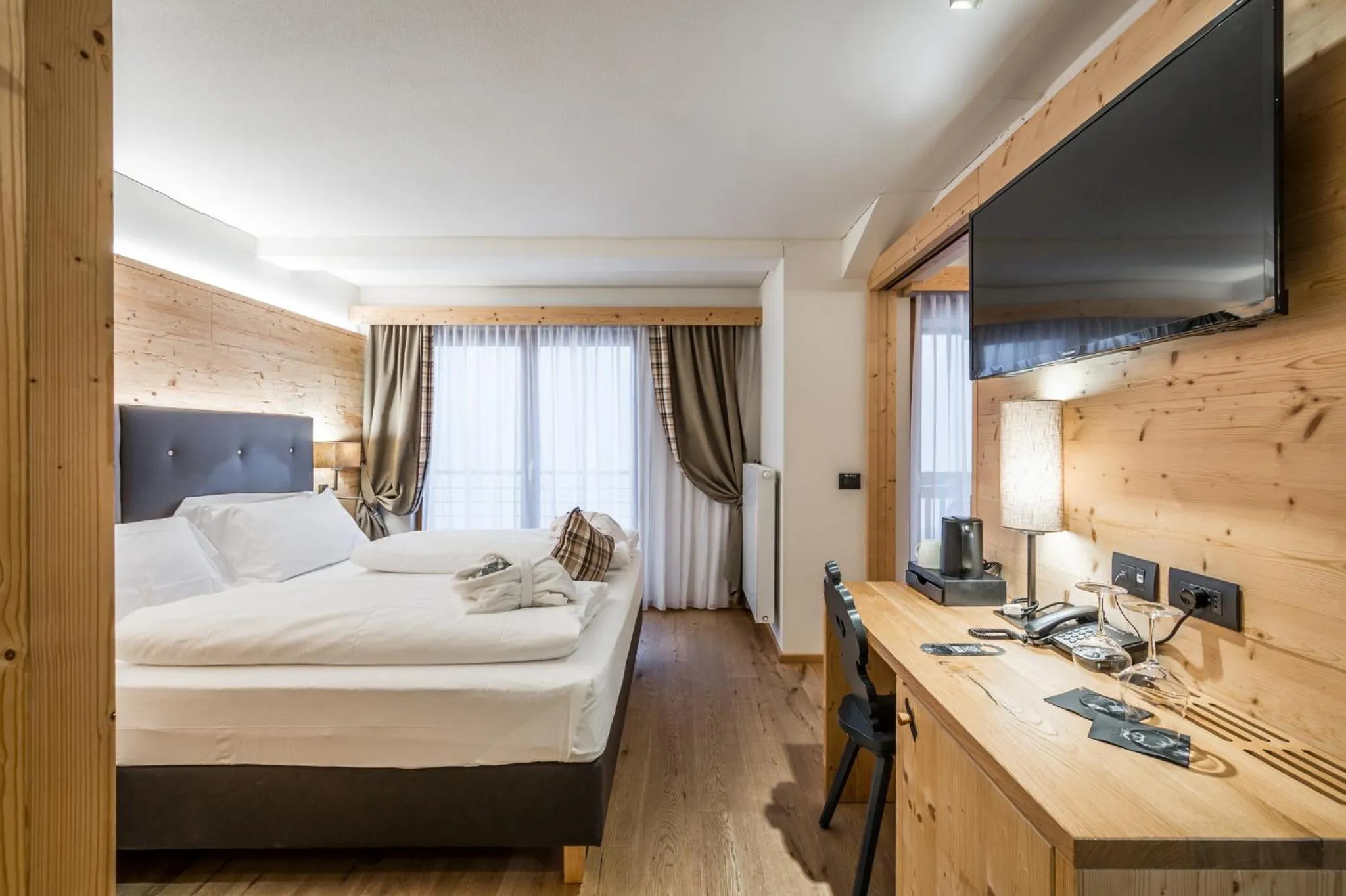 Bed in Hotel Ravelli Luxury Spa