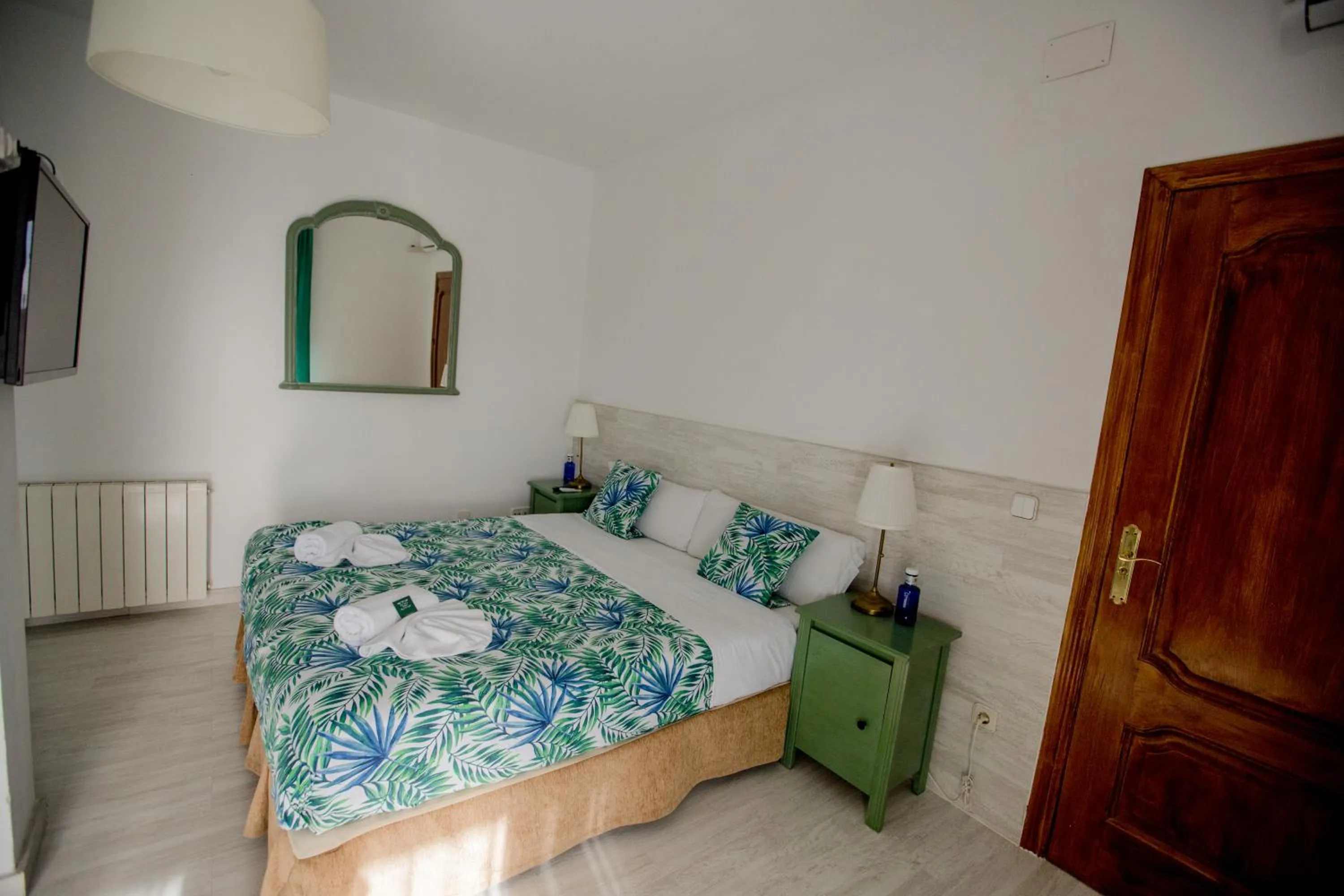 Bed in Hostal Escala Suites