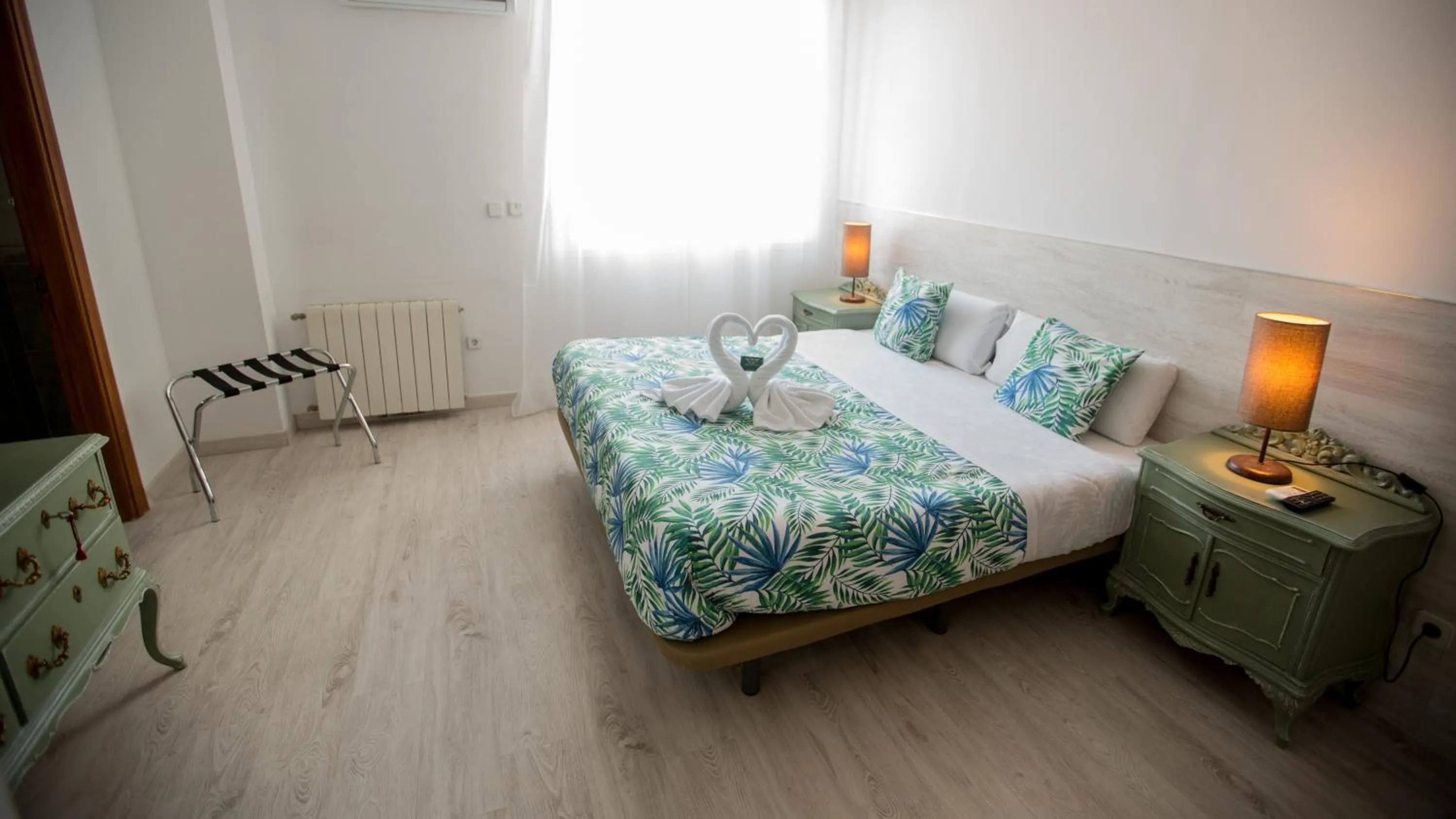 Bed in Hostal Escala Suites