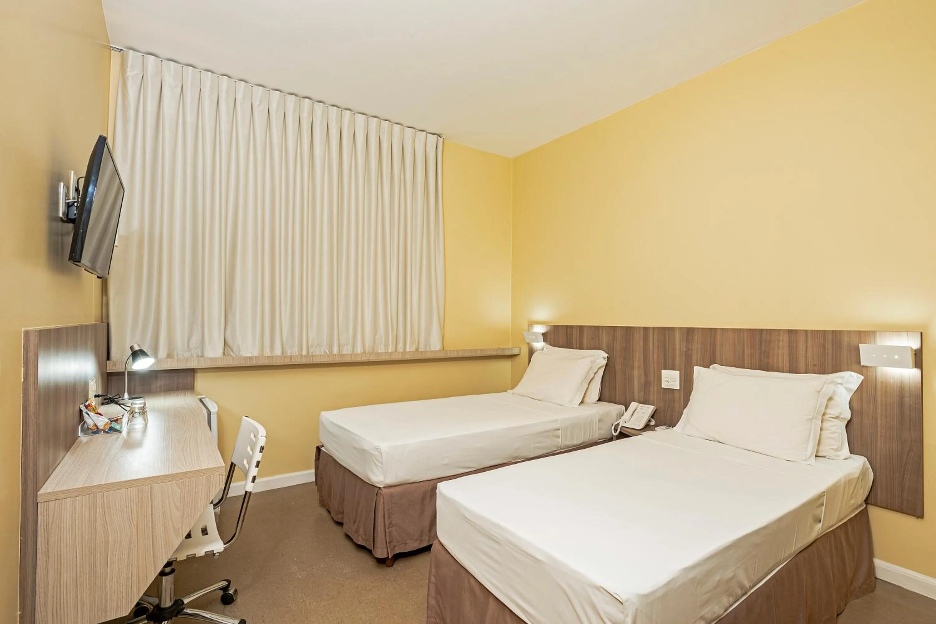 Bed in Slim Hotel Cuiabá Aeroporto