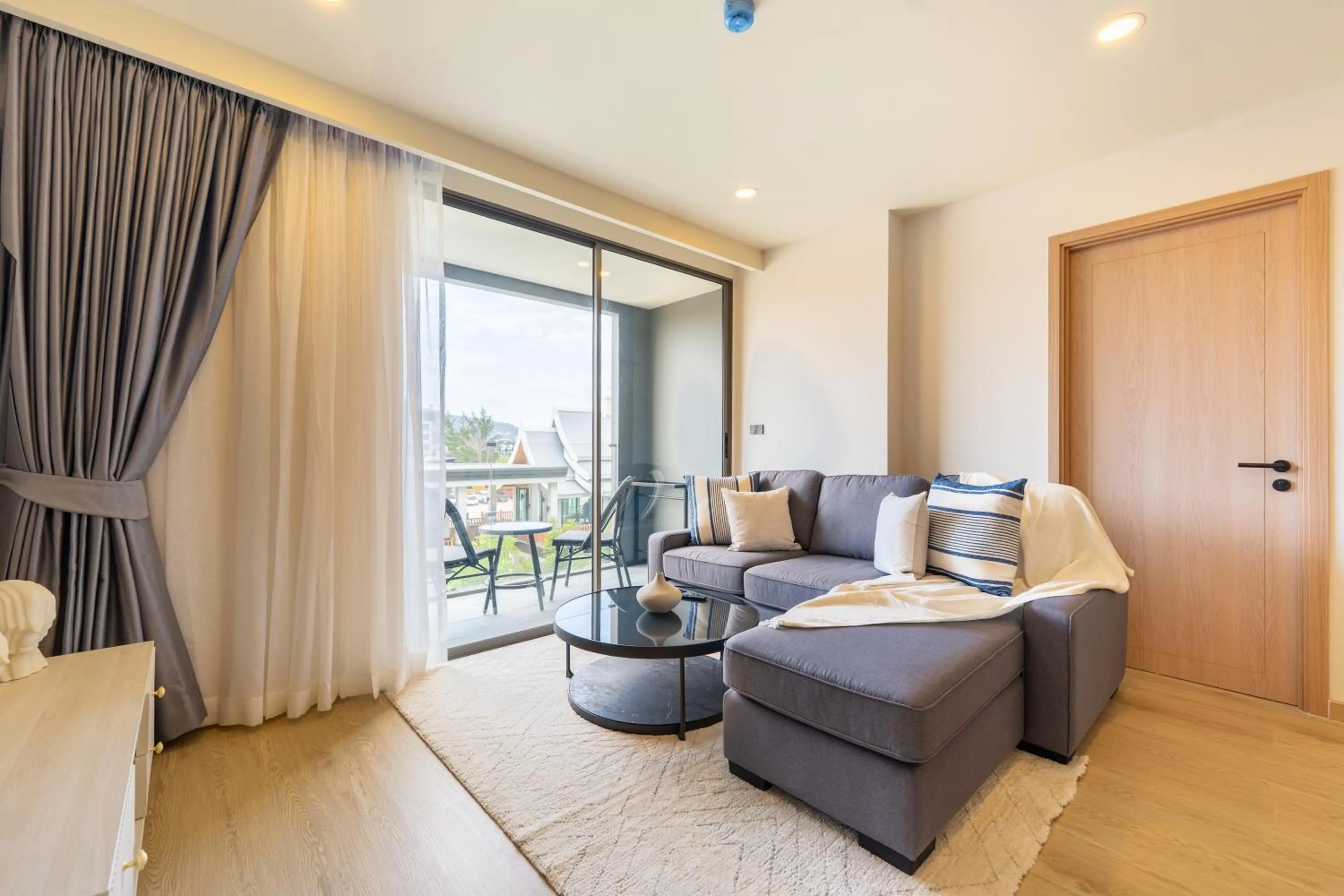 Living room, Bed in The Ozone Residences Bangtao
