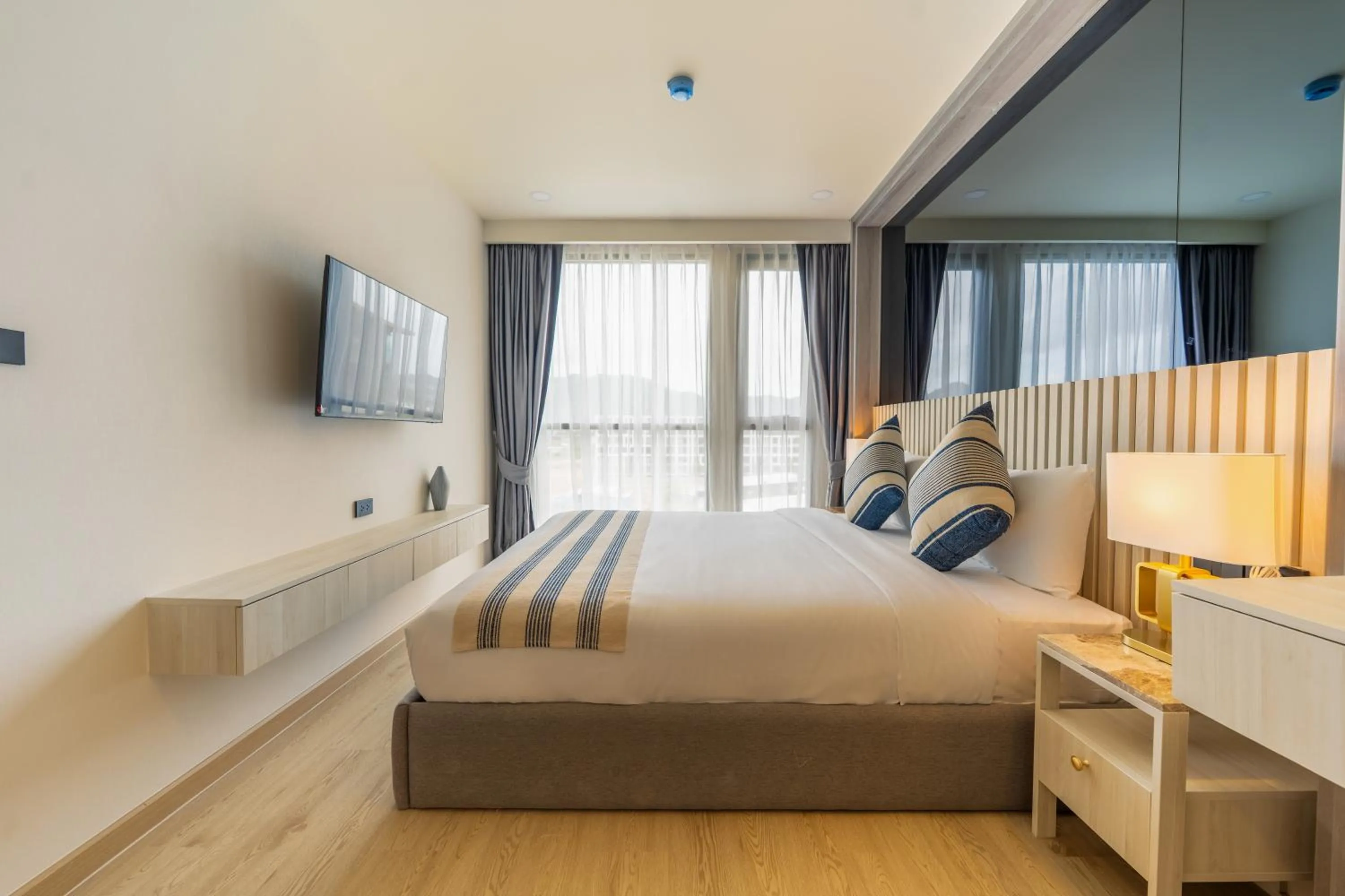 Bed in The Ozone Residences Bangtao