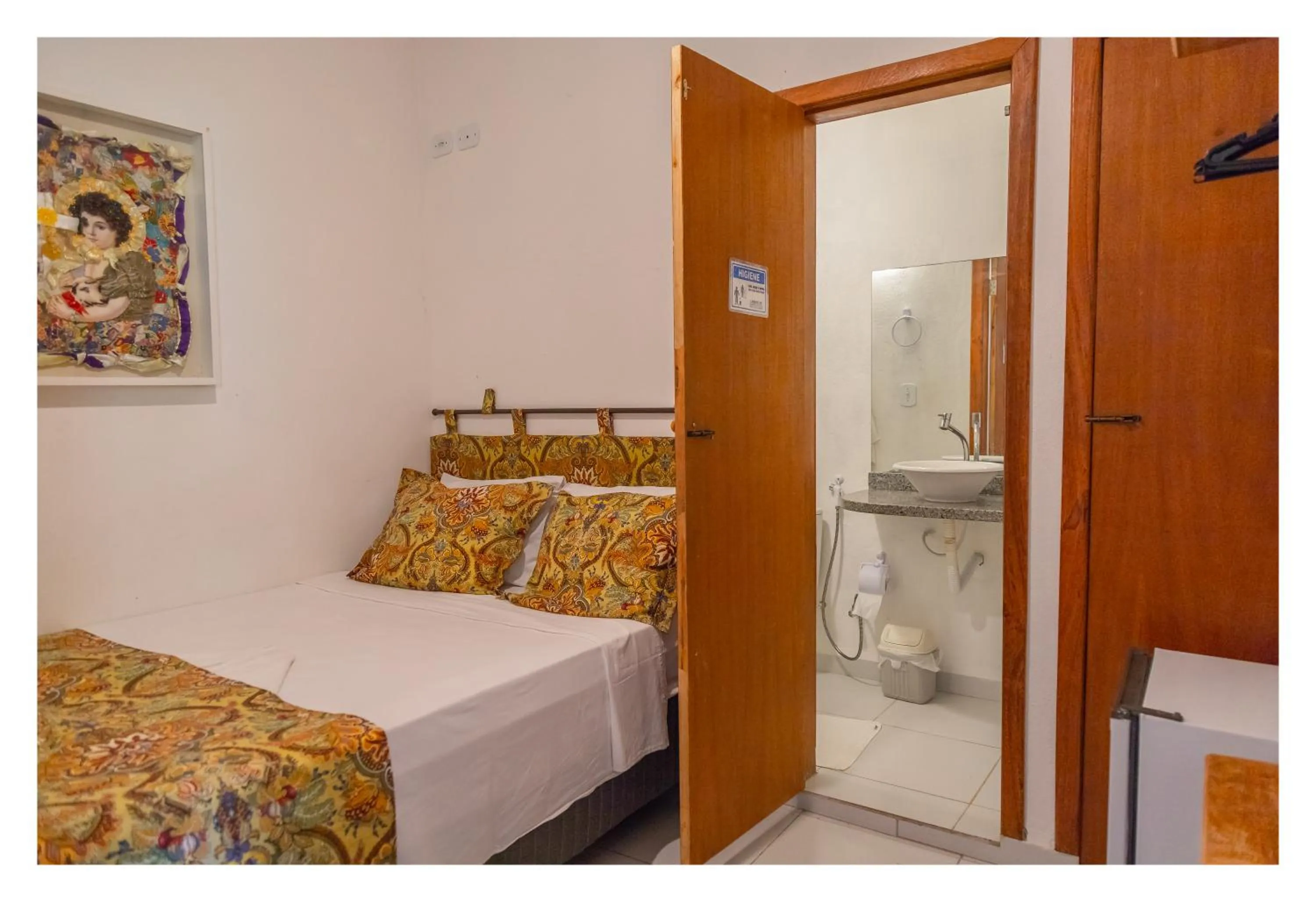 Bed in Pousada Cravo e Canela