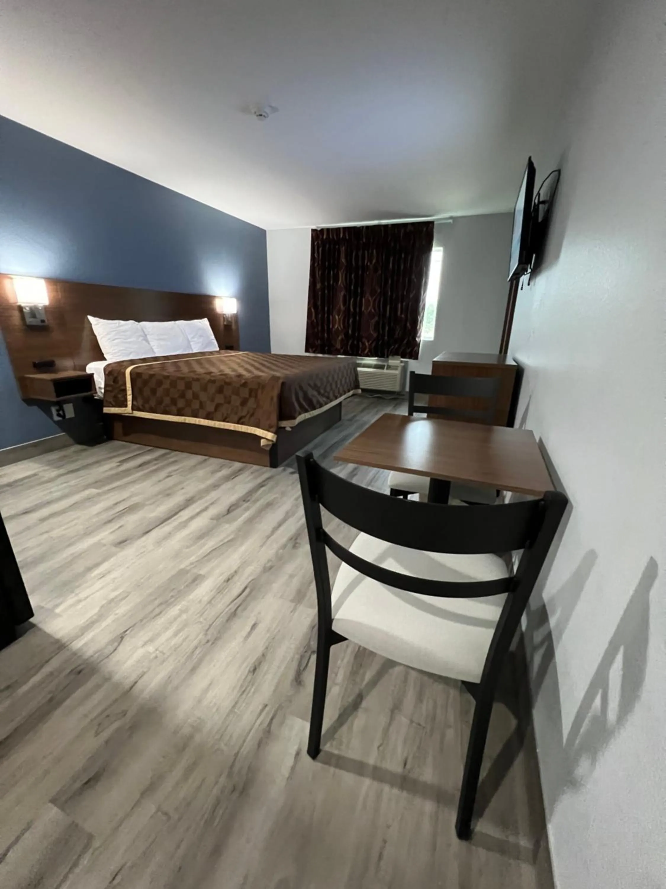 Bed in Relax Inn Channelview