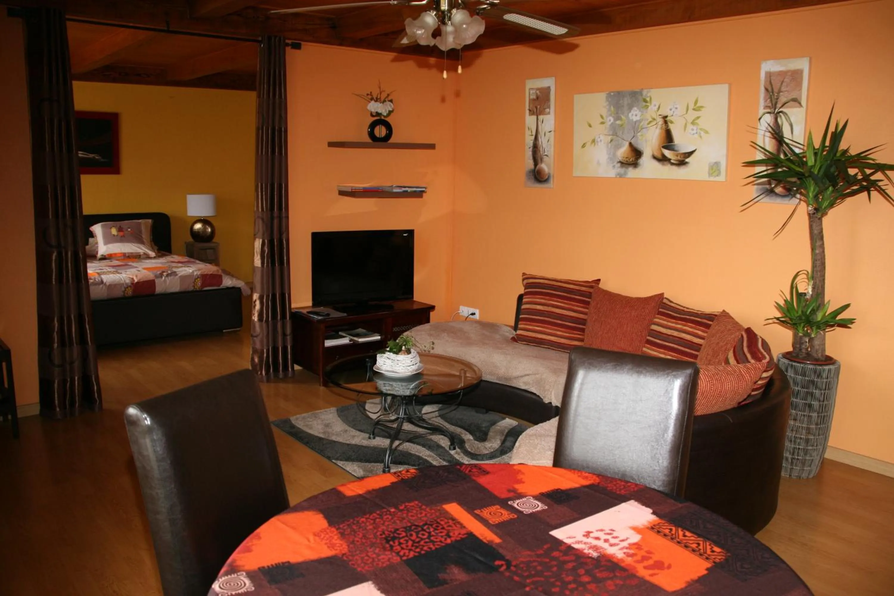 Living room, Bed in Chambres d'hôtes & Gîtes La Paysanne