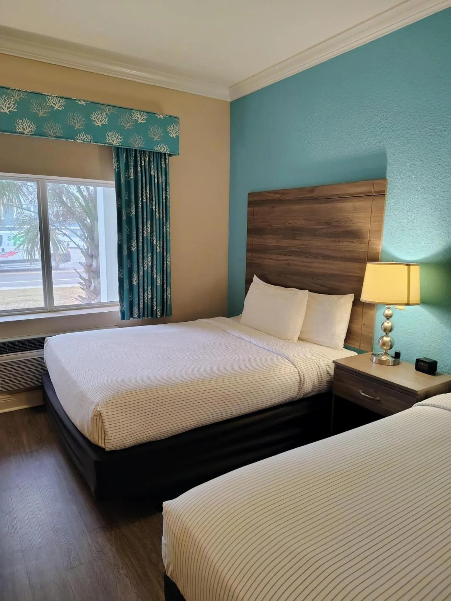 Bed in Amelia Hotel at the Beach