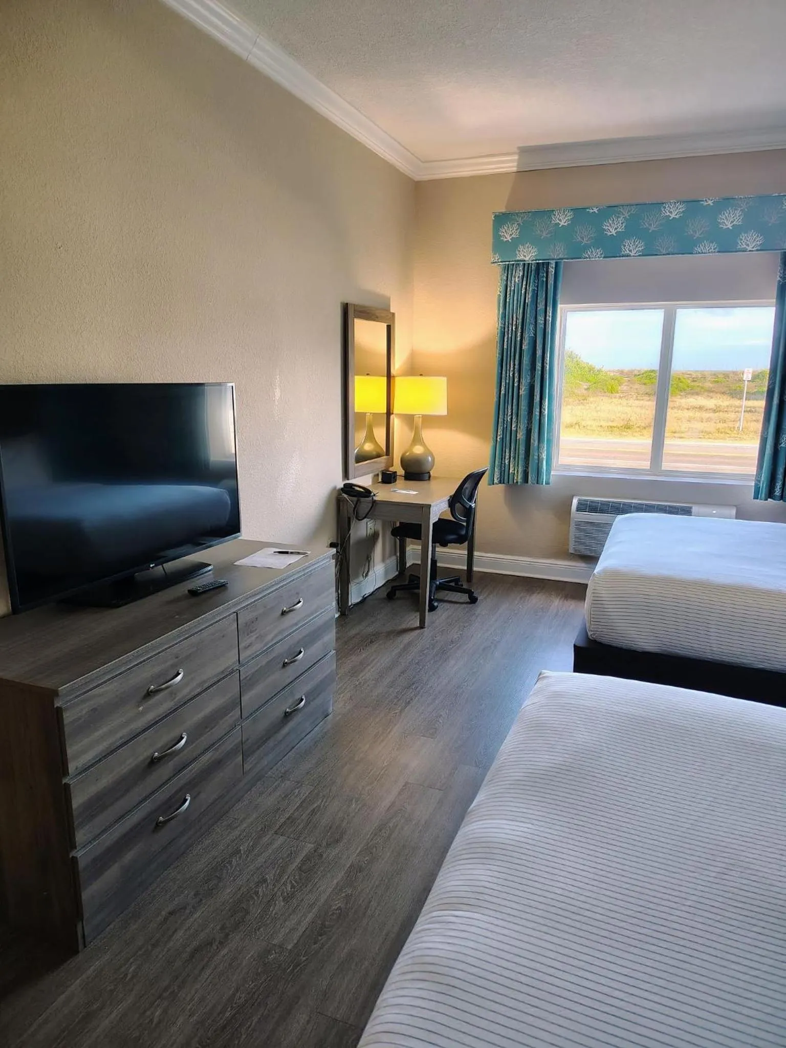 Bed in Amelia Hotel at the Beach