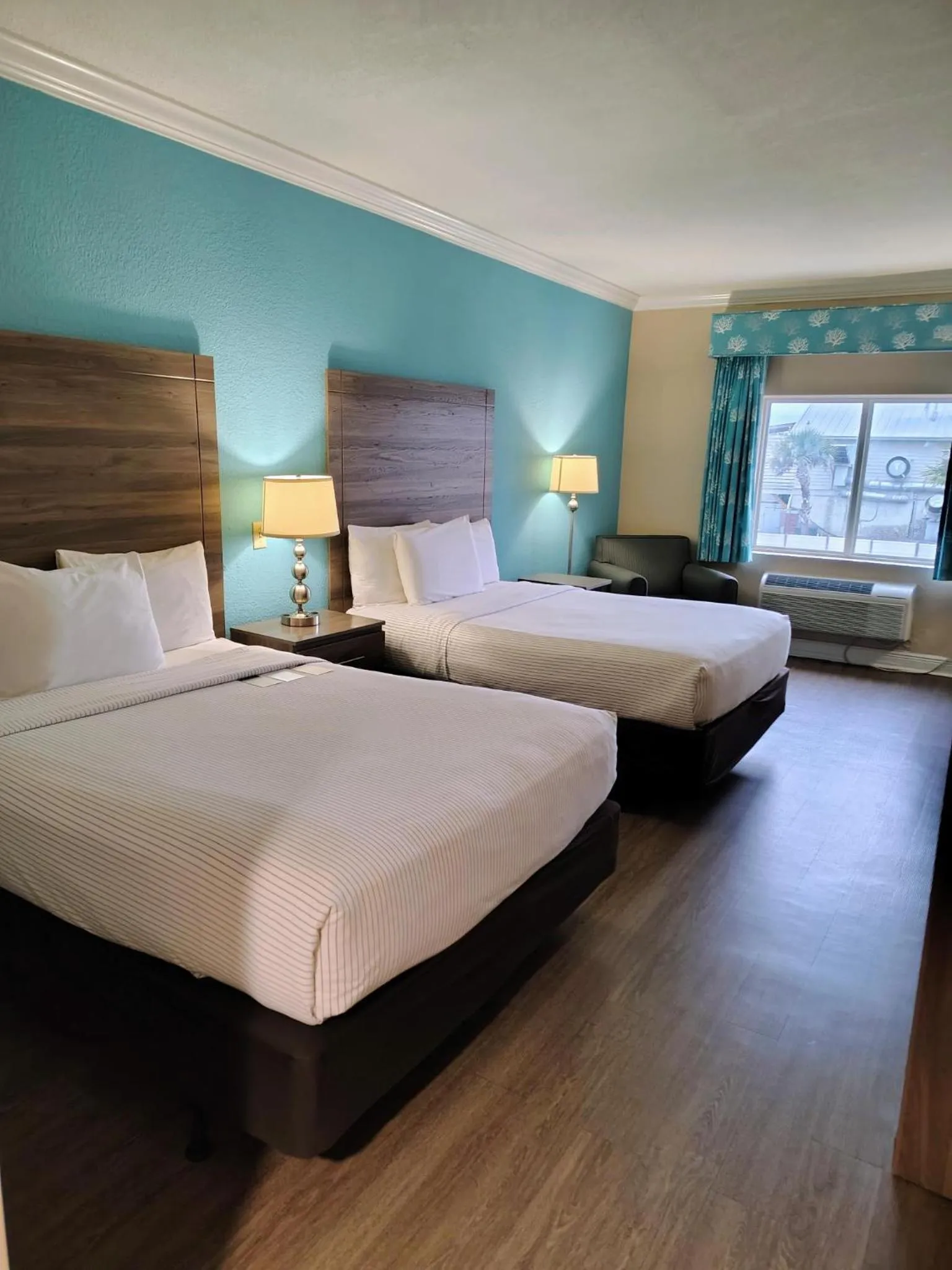 Bed in Amelia Hotel at the Beach