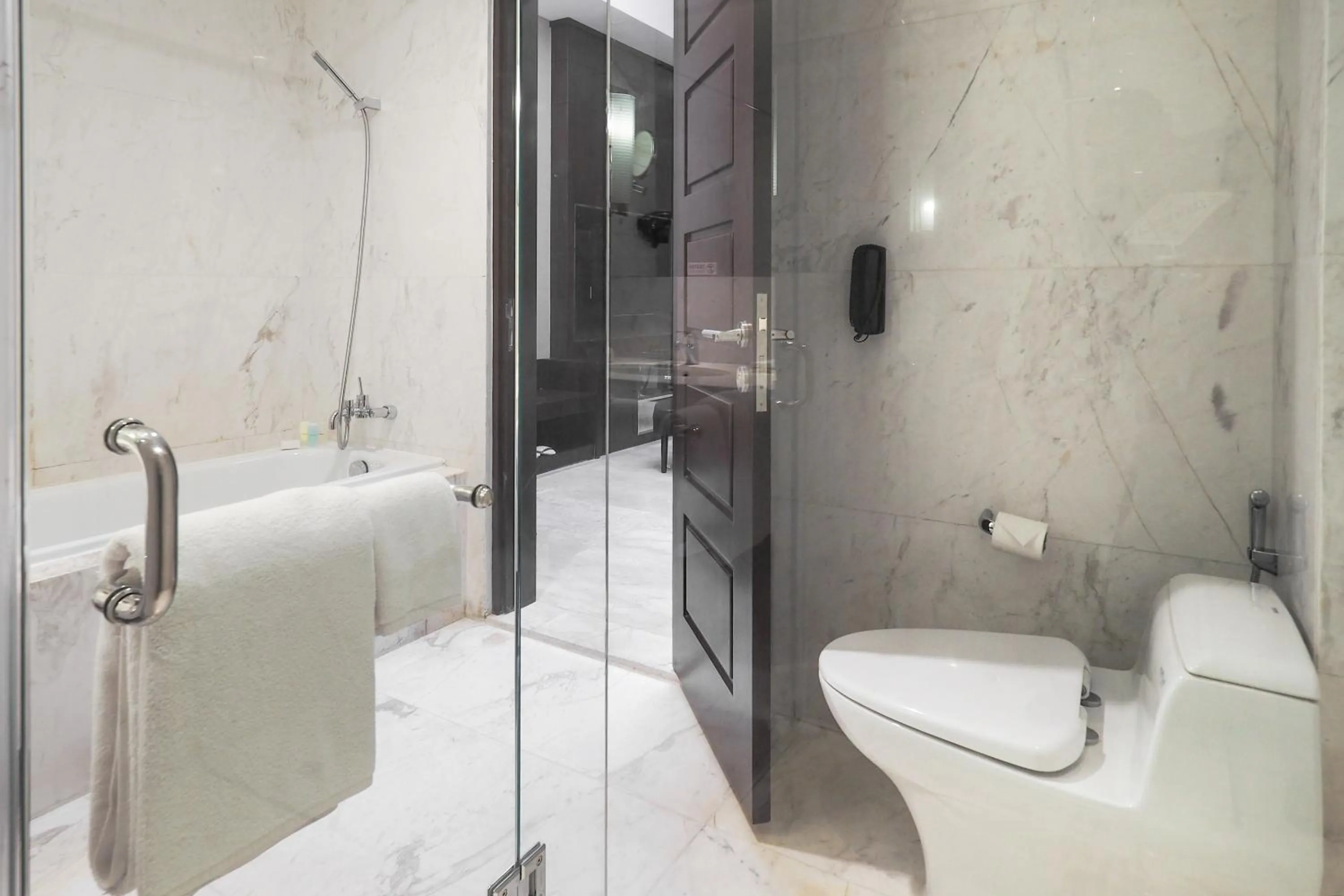 Bathroom in Grand Mercure Solo Baru