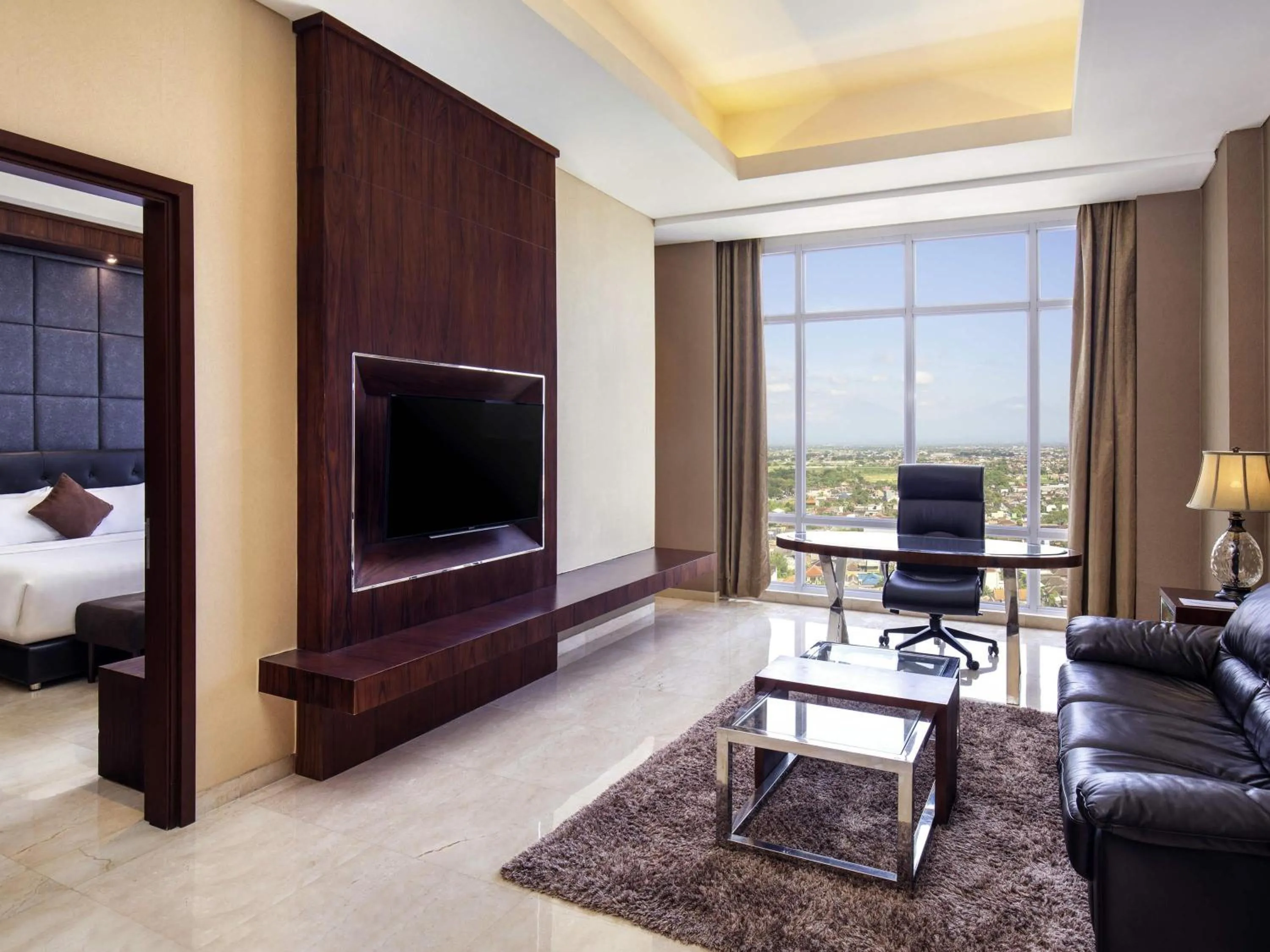 Bedroom in Grand Mercure Solo Baru