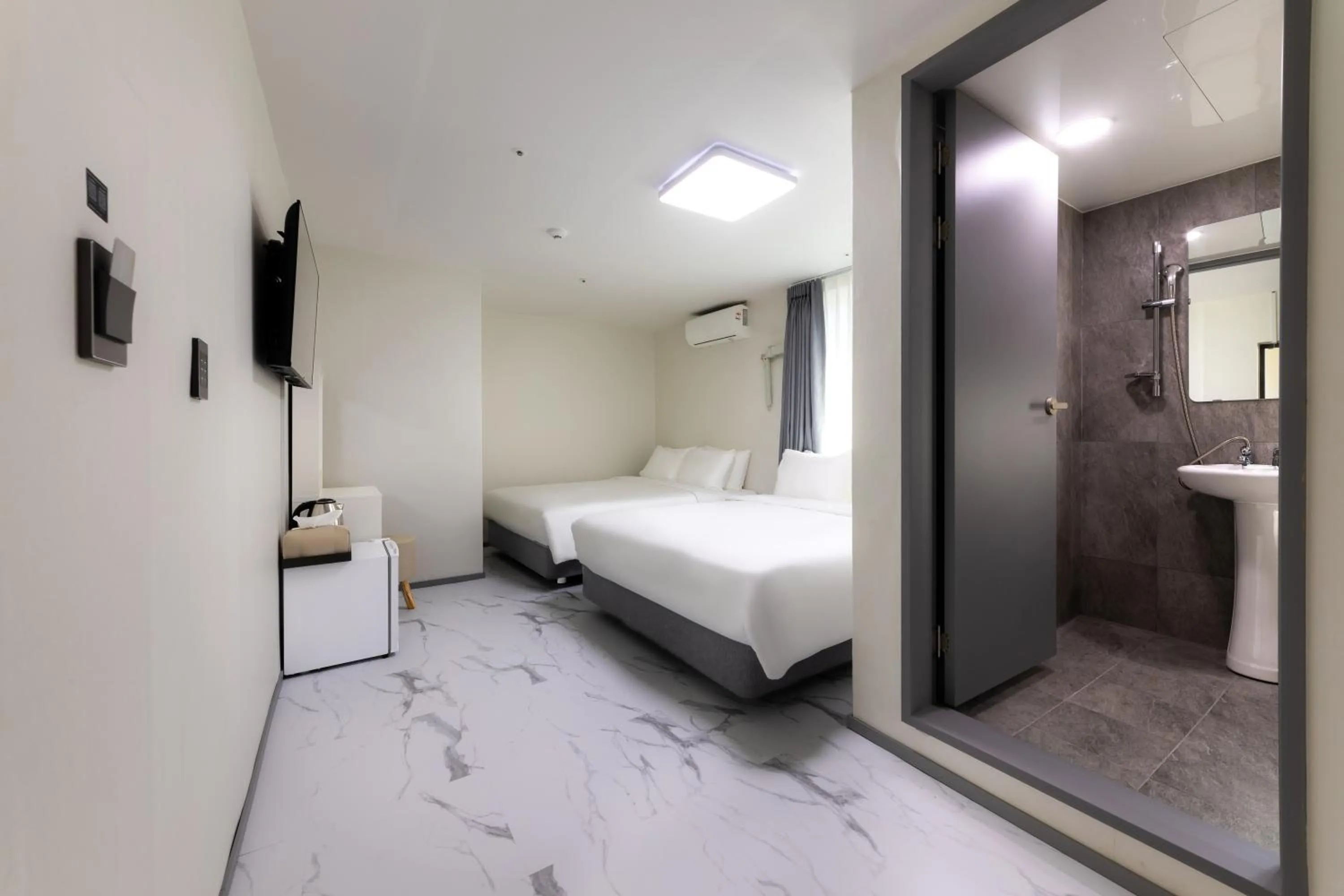 Bed in MJ Hotel Jongno