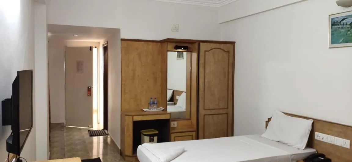 Photo of the whole room, Bed in Hotel Sri Ram Residency