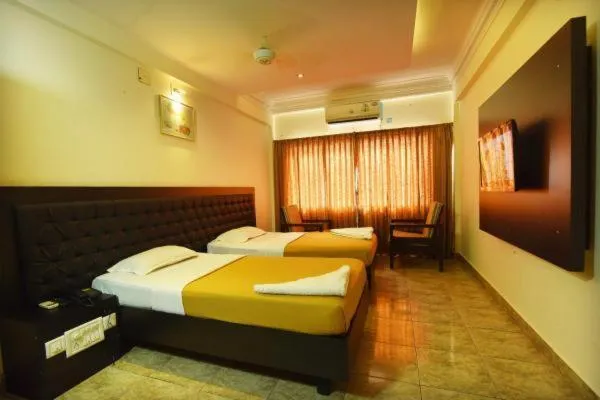 Bed in Hotel Sri Ram Residency