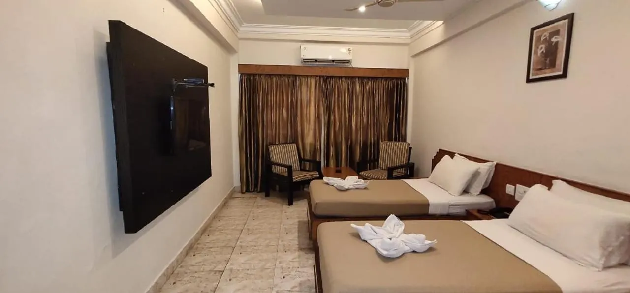 Photo of the whole room, Bed in Hotel Sri Ram Residency