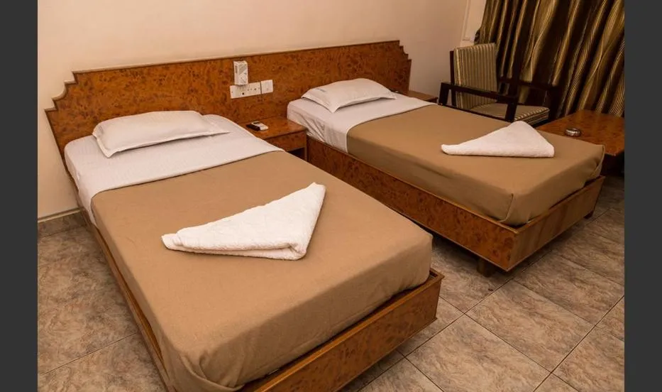 Photo of the whole room, Bed in Hotel Sri Ram Residency