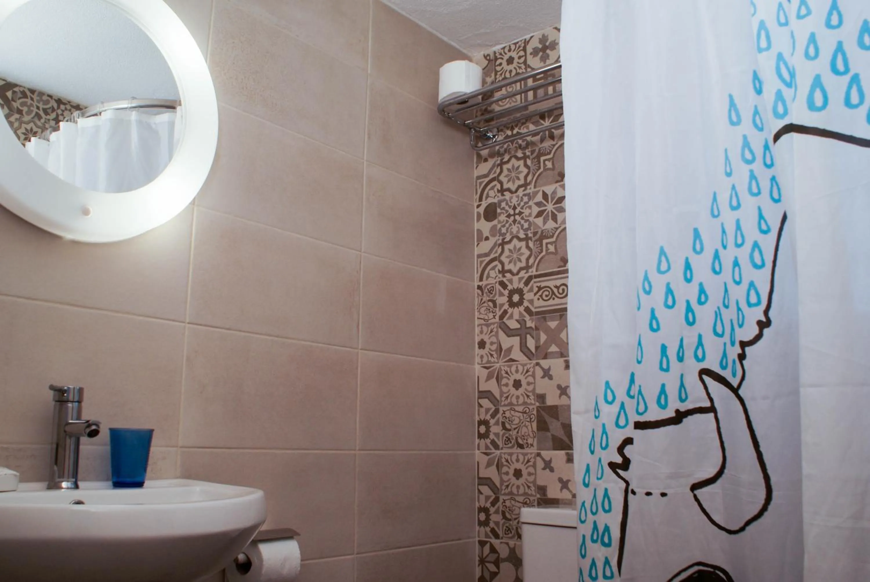 Bathroom in Blue Era Apartments