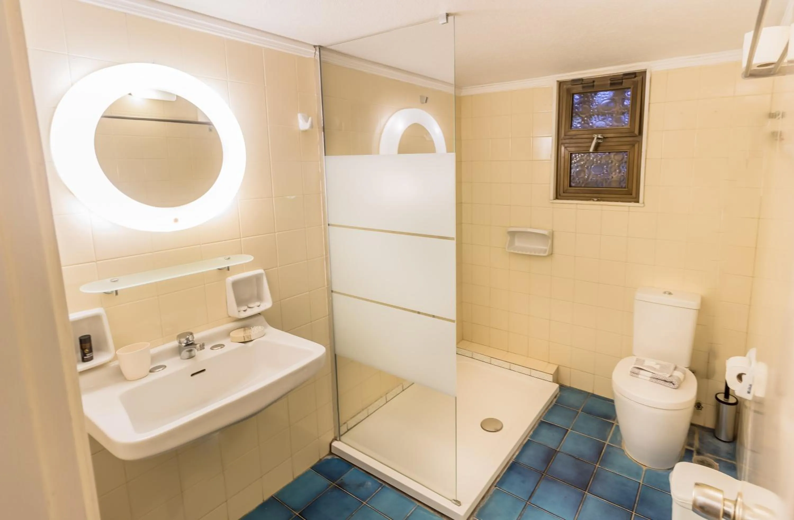 Bathroom in Blue Era Apartments