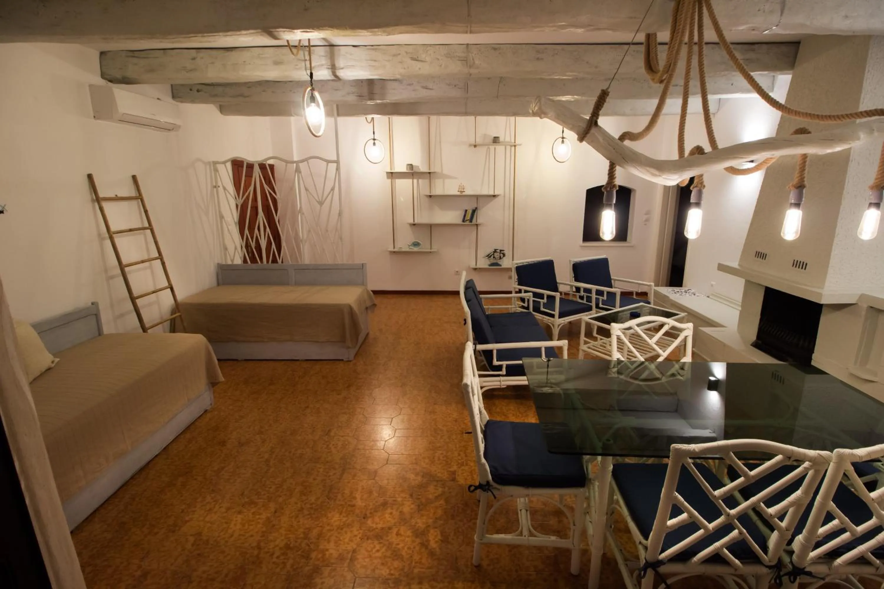 Bed in Blue Era Apartments