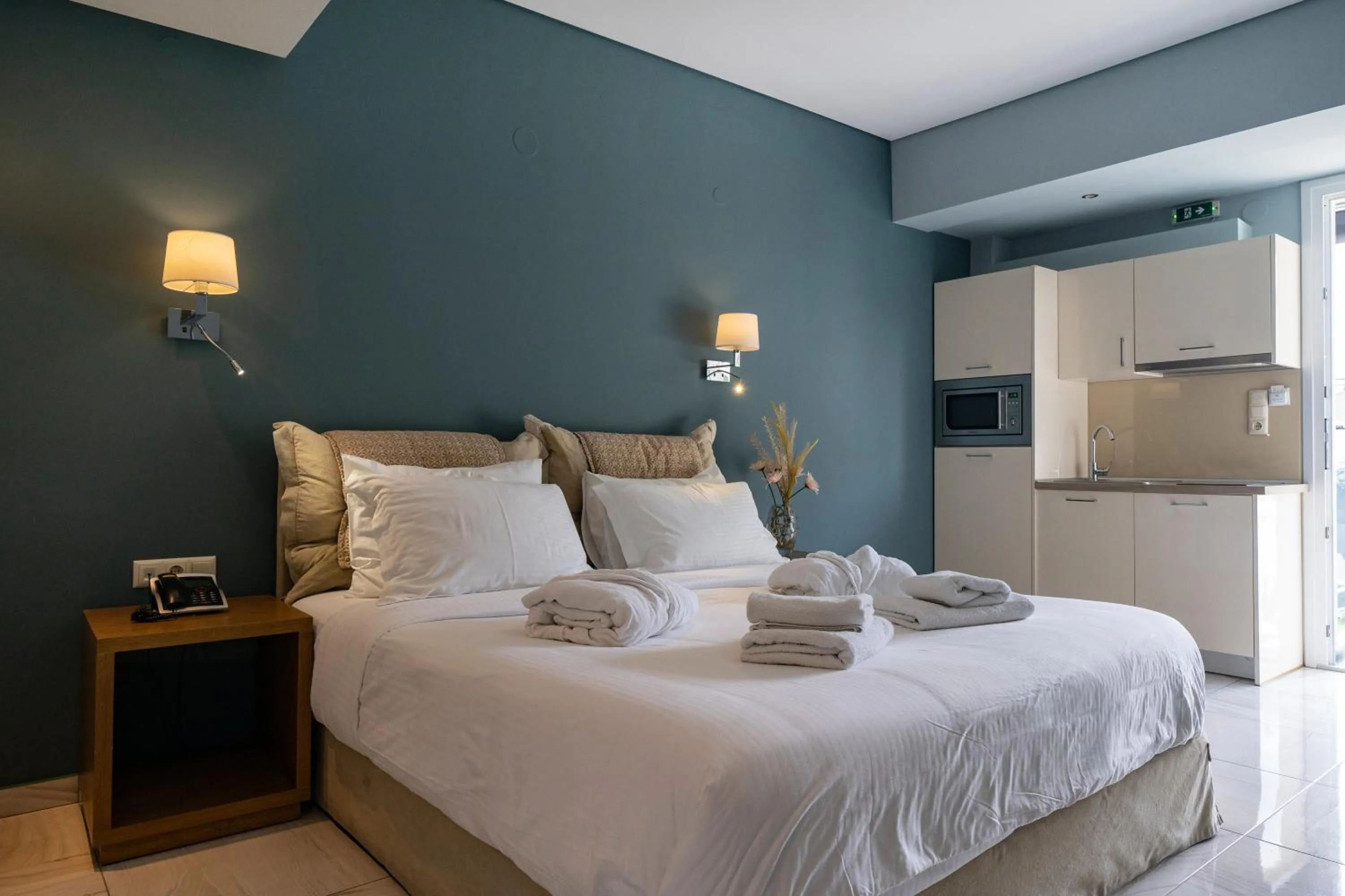 Bed in Edem Luxury Apartments