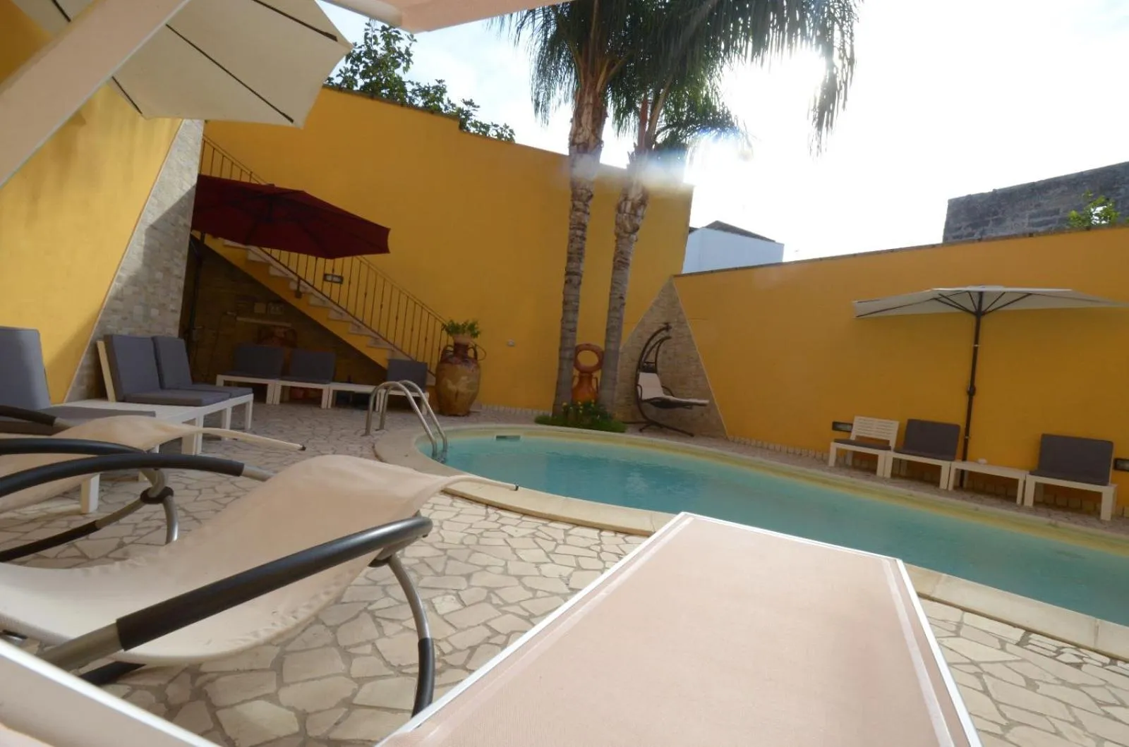 Swimming pool in B&B Corte Dei Figuli