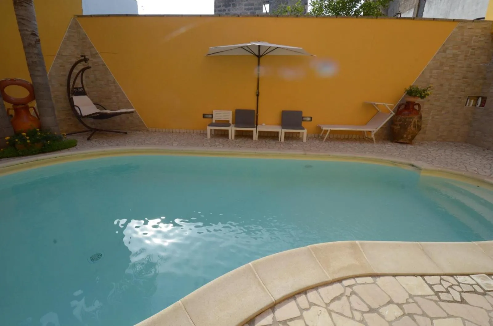 Swimming pool in B&B Corte Dei Figuli