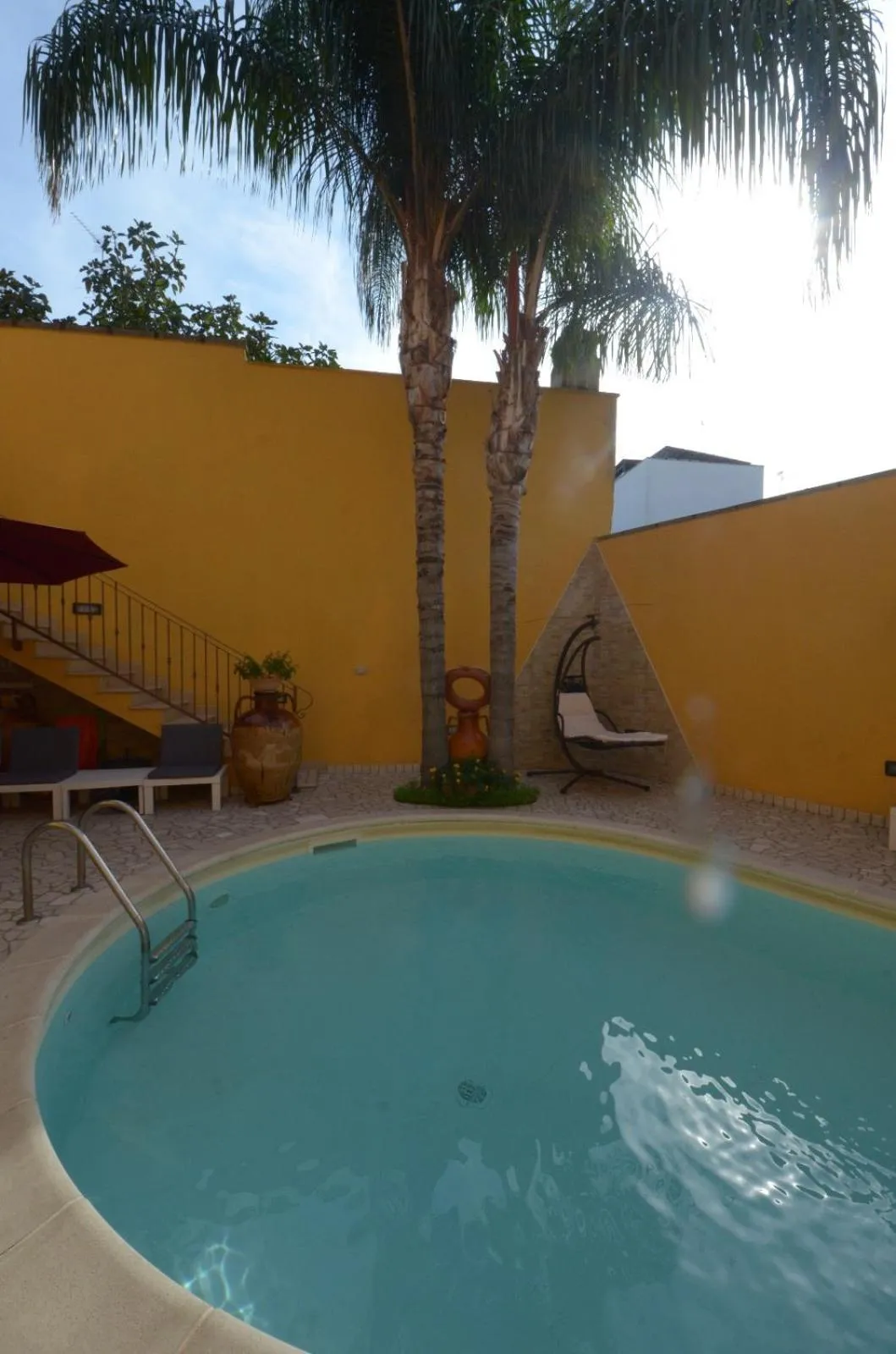 Swimming pool in B&B Corte Dei Figuli