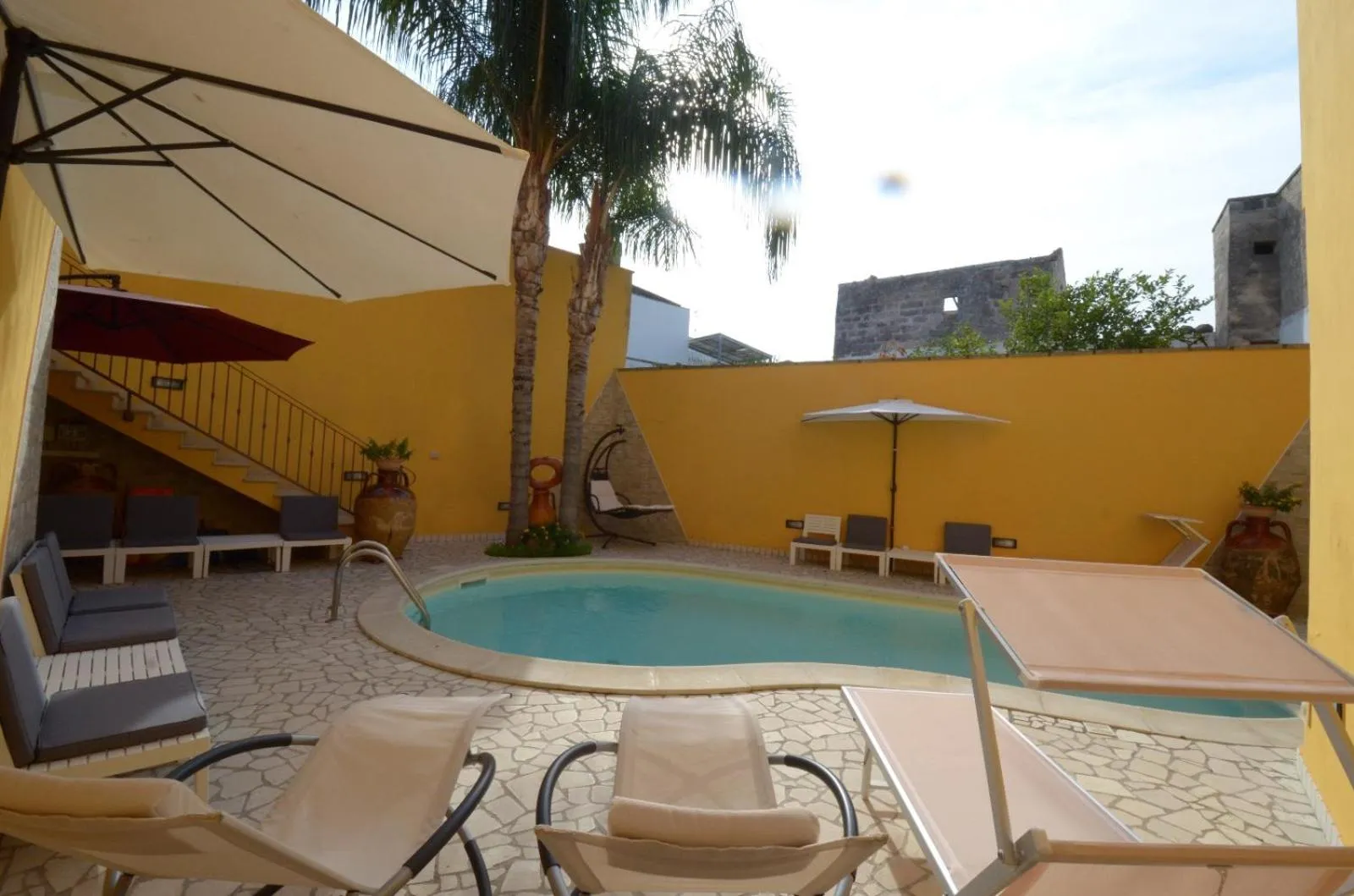 Swimming pool in B&B Corte Dei Figuli