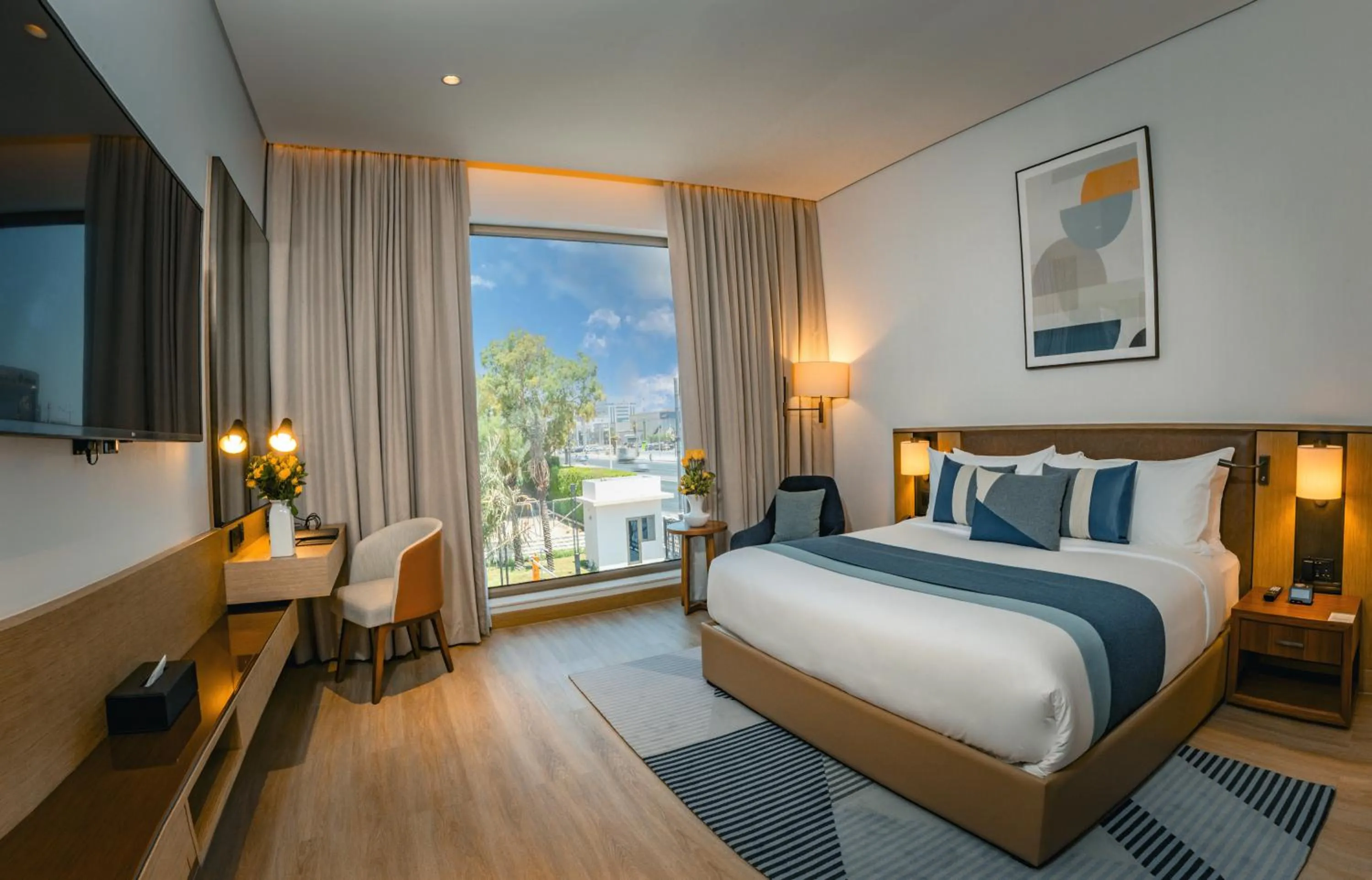 Bed in First Grand Hotel