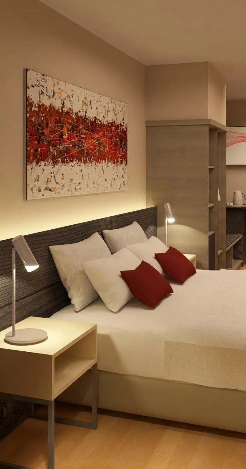 Bed in Ramada Suites by Wyndham Asuncion Aeropuerto