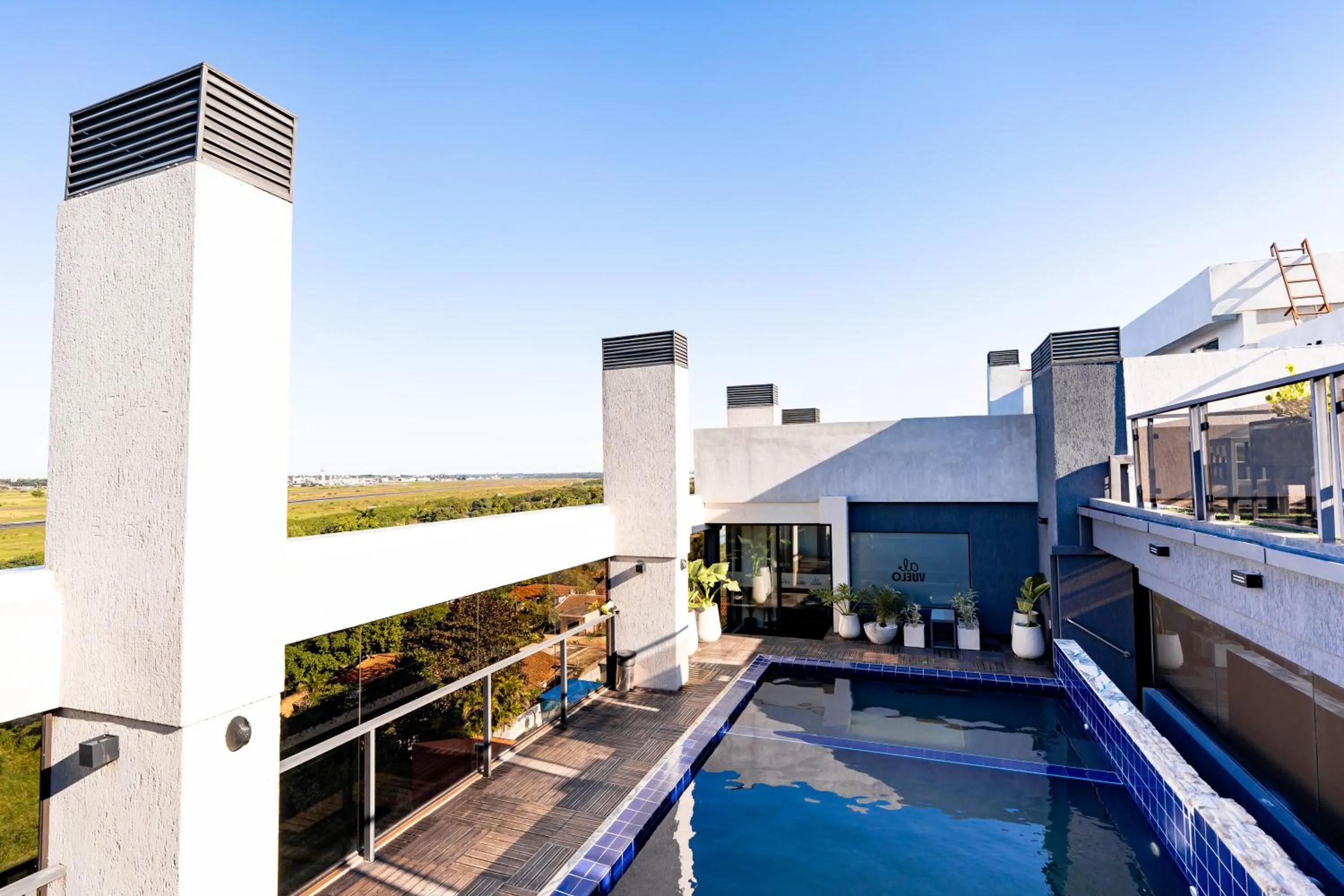 Pool view in Ramada Suites by Wyndham Asuncion Aeropuerto