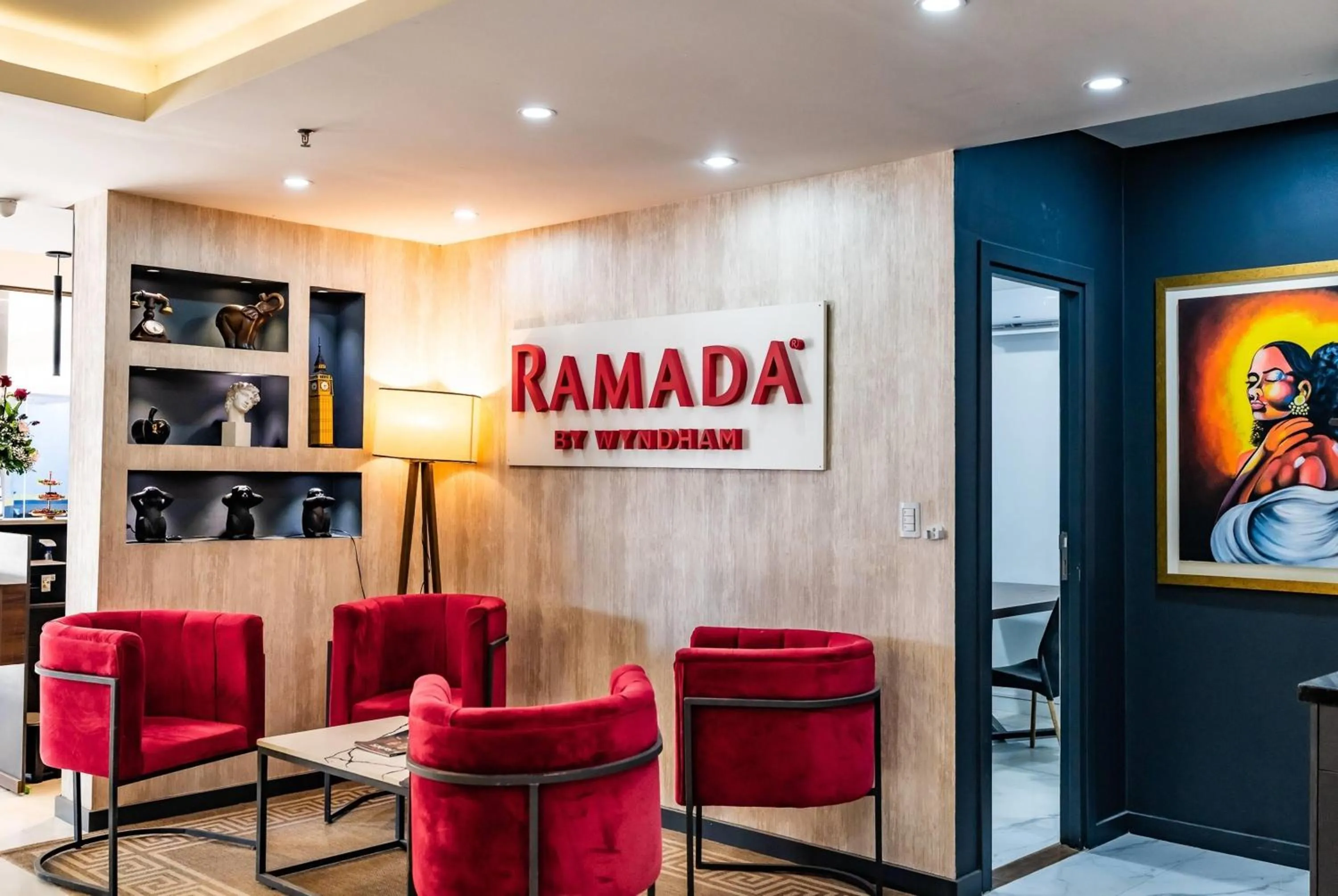 Lobby or reception in Ramada Suites by Wyndham Asuncion Aeropuerto