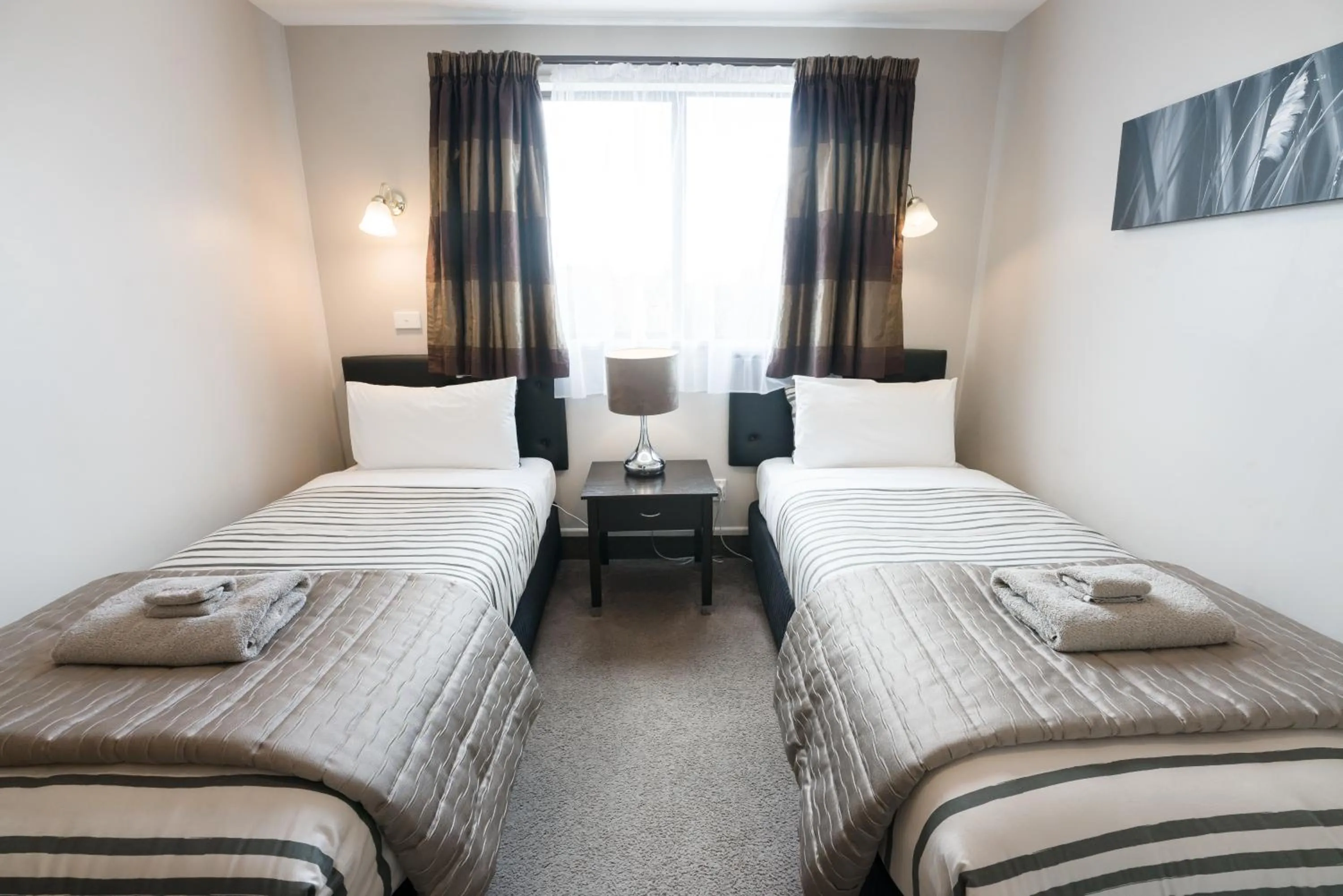 Bed in Strathern Motor Lodge