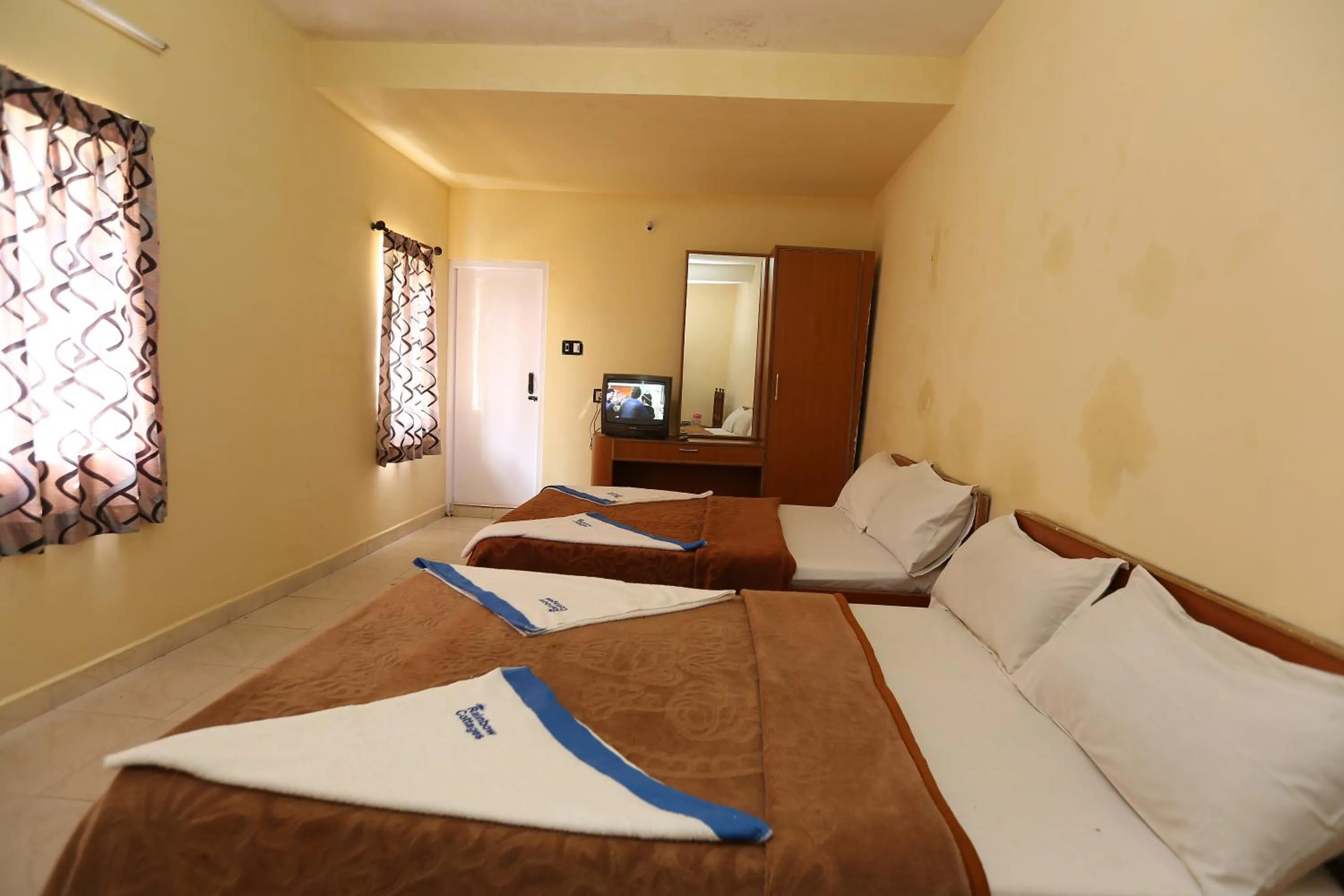 Photo of the whole room, Bed in Rainbow Cottages-Budget Friendly rooms