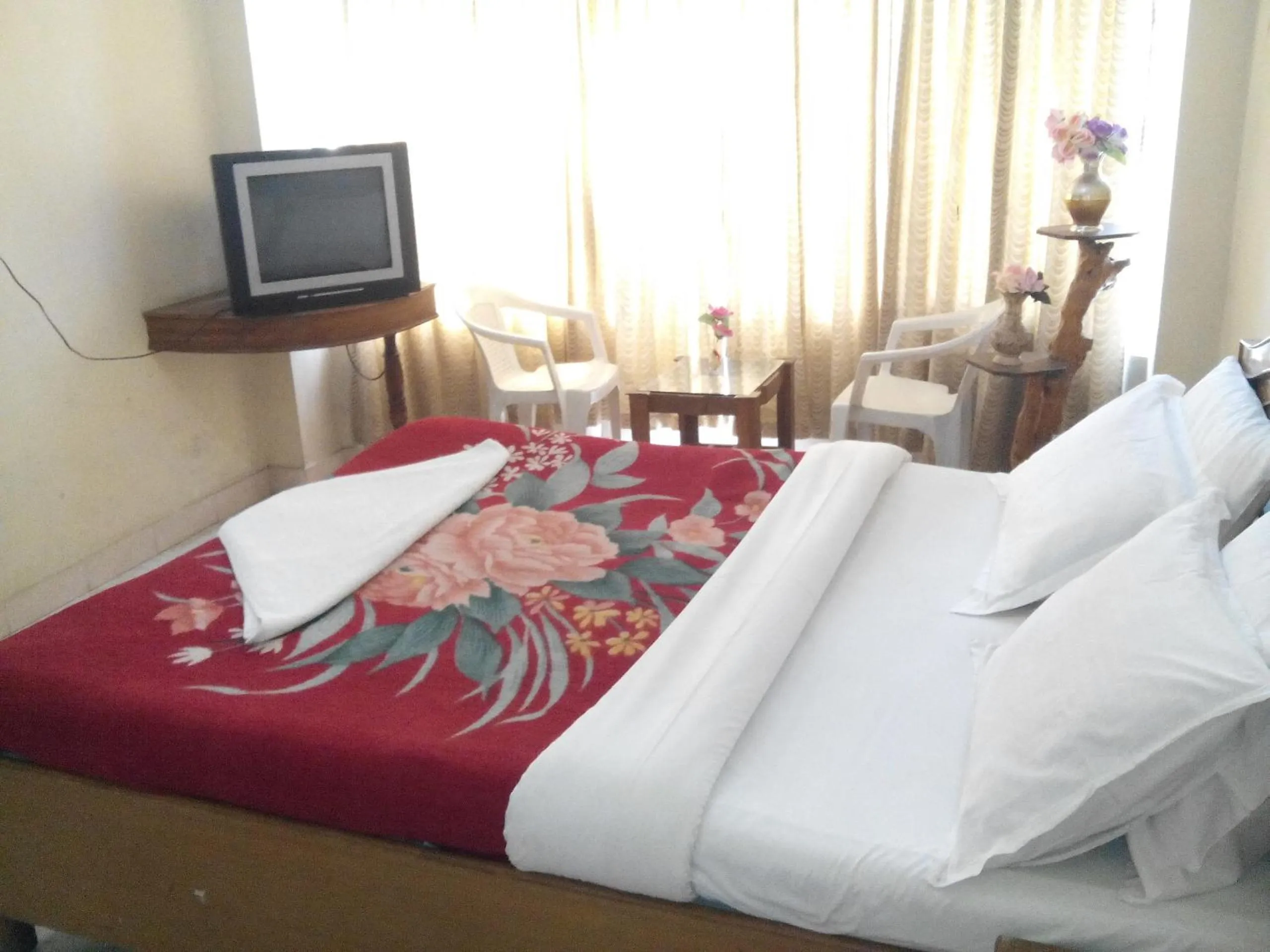Day, Bed in Rainbow Cottages-Budget Friendly rooms
