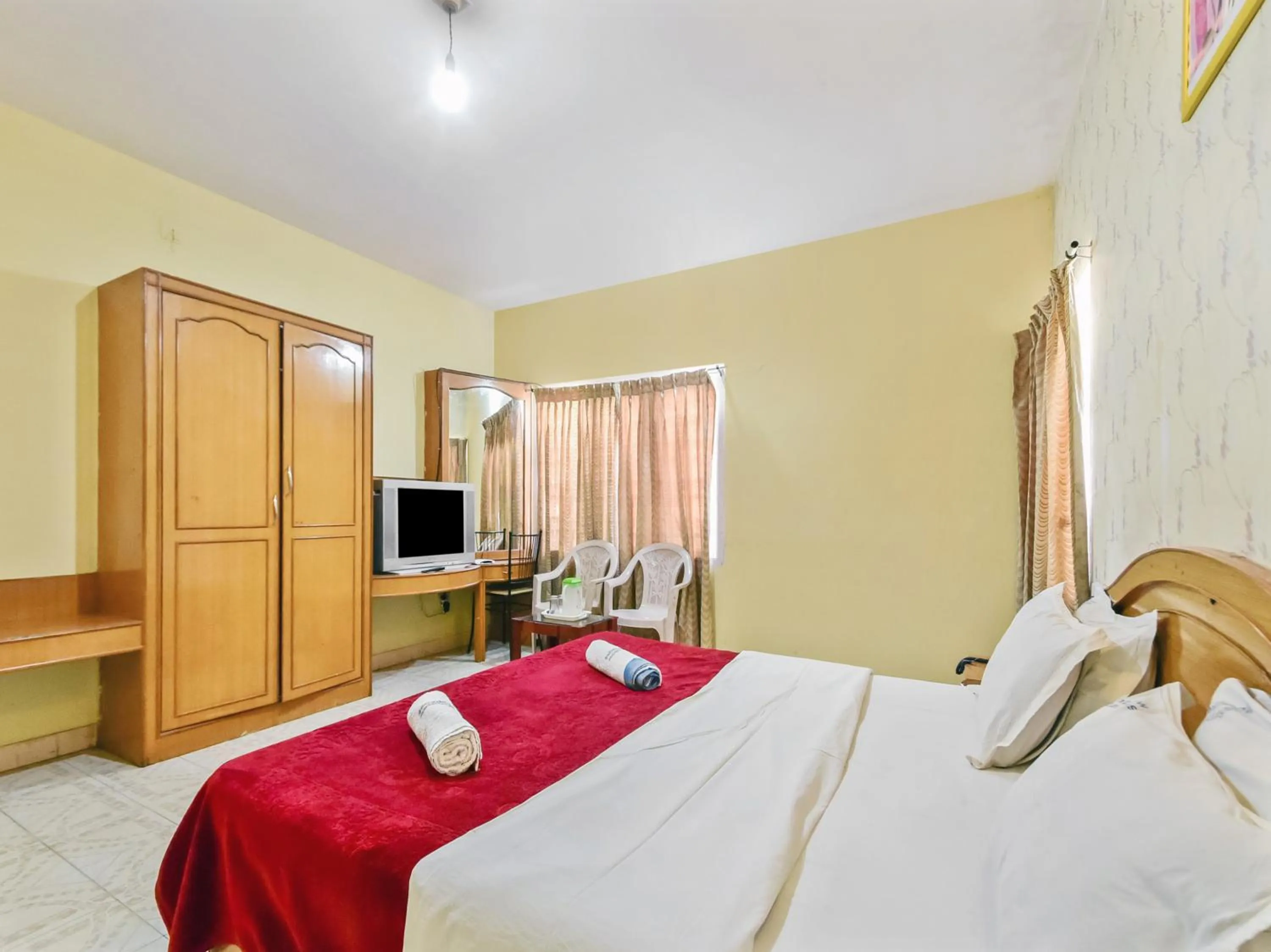 Bed in Rainbow Cottages-Budget Friendly rooms