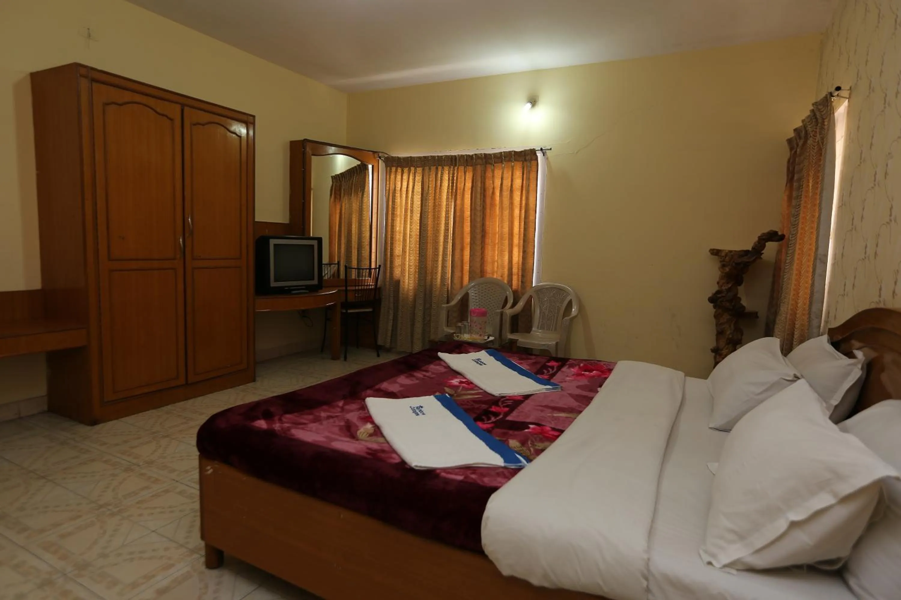 Photo of the whole room, Bed in Rainbow Cottages-Budget Friendly rooms