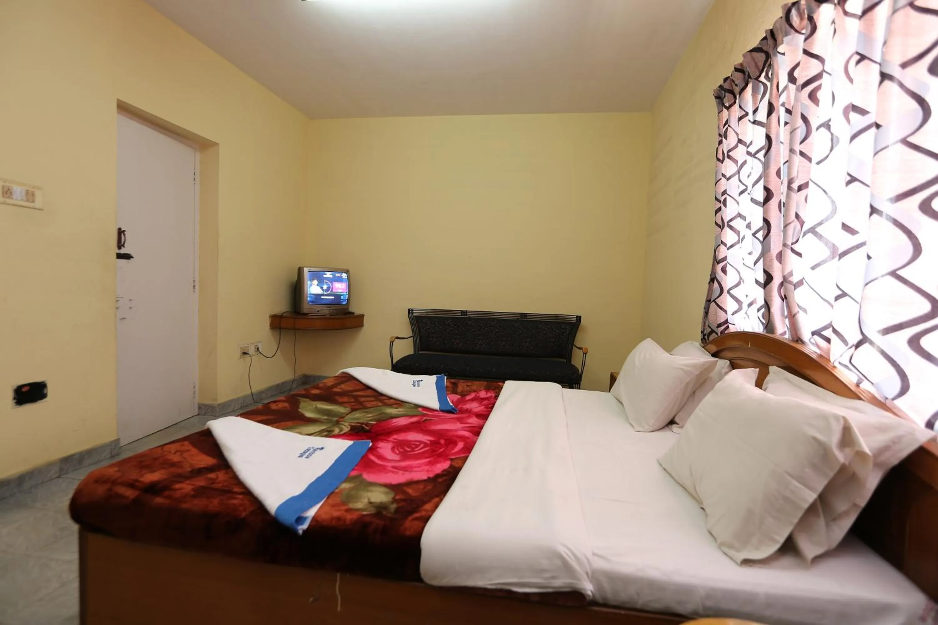 Photo of the whole room, Bed in Rainbow Cottages-Budget Friendly rooms