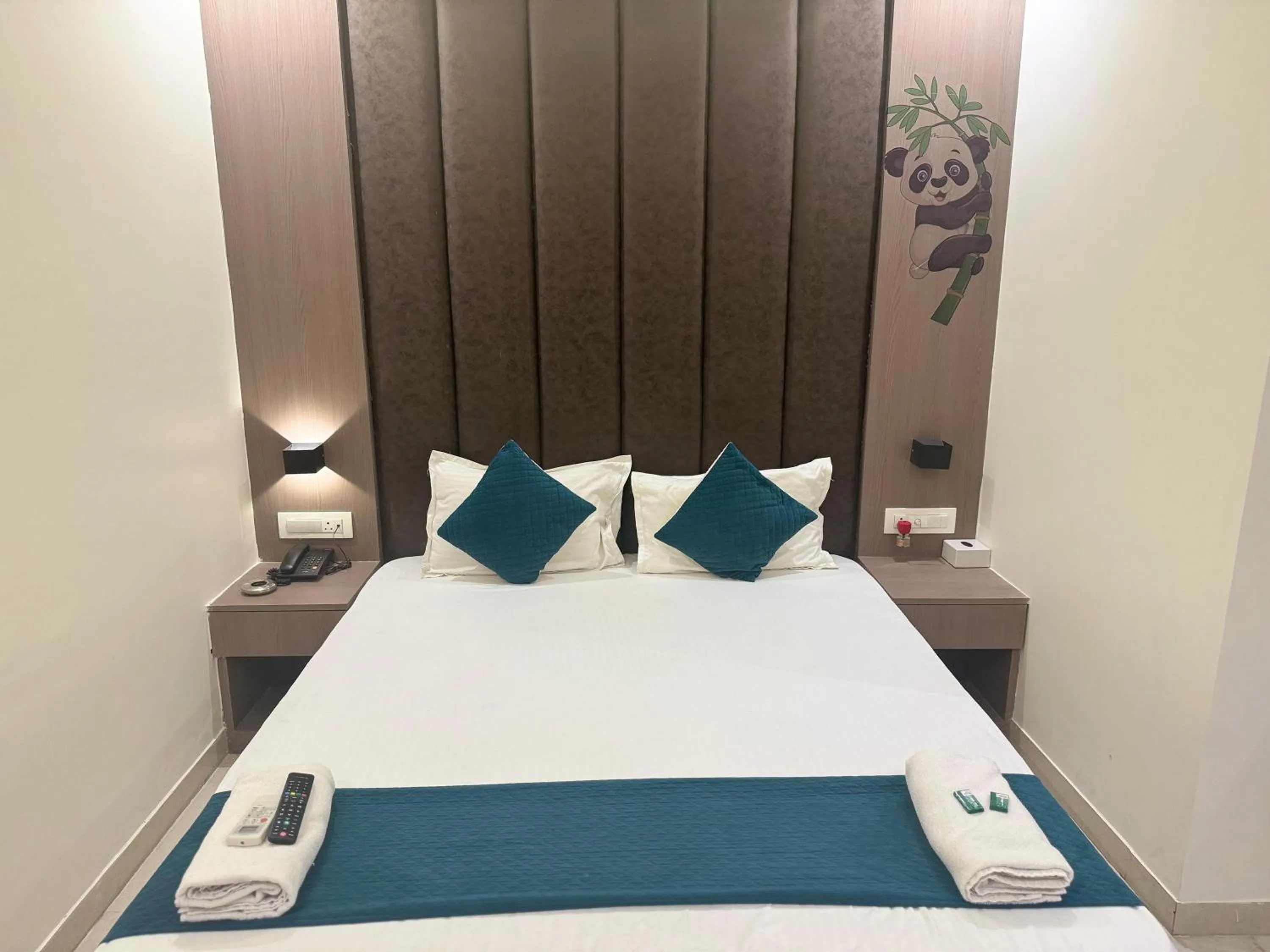 Bed in Hotel Sahara Residency